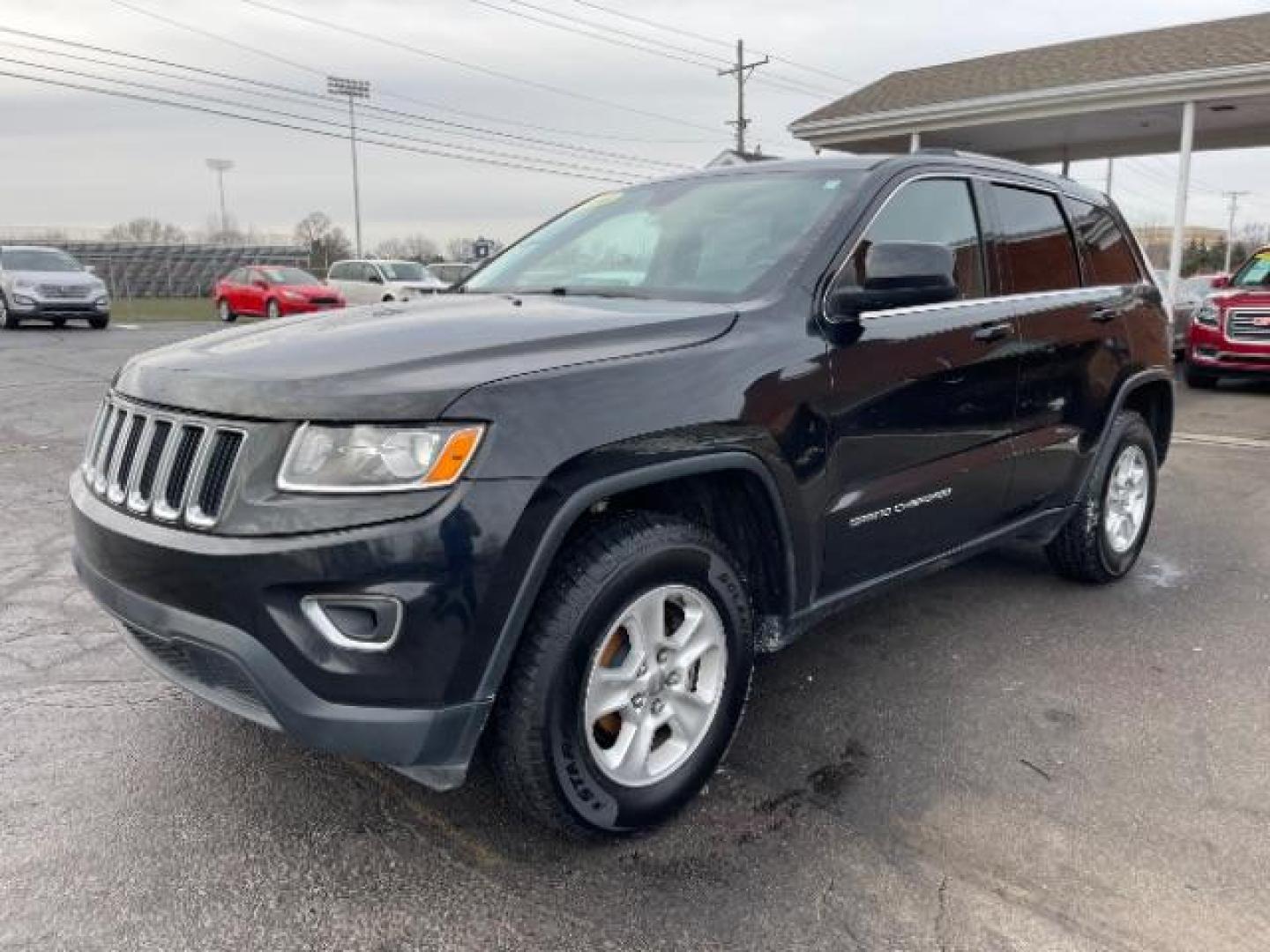 2016 Brilliant Black Crystal Pearl Coat Jeep Grand Cherokee Laredo 4WD (1C4RJFAG0GC) with an 3.6L V6 DOHC 24V engine, 8-Speed Automatic transmission, located at 1230 East Main St, Xenia, OH, 45385, (937) 908-9800, 39.688026, -83.910172 - Photo#1