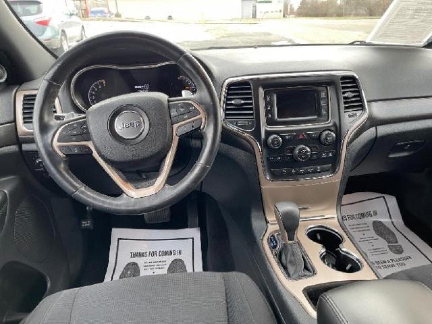 2016 Brilliant Black Crystal Pearl Coat Jeep Grand Cherokee Laredo 4WD (1C4RJFAG0GC) with an 3.6L V6 DOHC 24V engine, 8-Speed Automatic transmission, located at 1230 East Main St, Xenia, OH, 45385, (937) 908-9800, 39.688026, -83.910172 - Photo#7