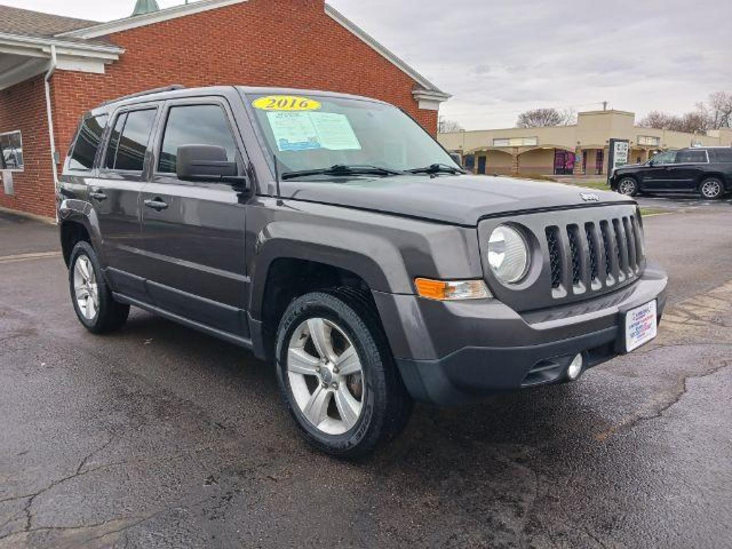 2016 Gray Jeep Patriot Latitude 4WD (1C4NJRFB8GD) with an 2.4L L4 DOHC 16V engine, located at 1184 Kauffman Ave, Fairborn, OH, 45324, (937) 908-9800, 39.807072, -84.030914 - Photo#0