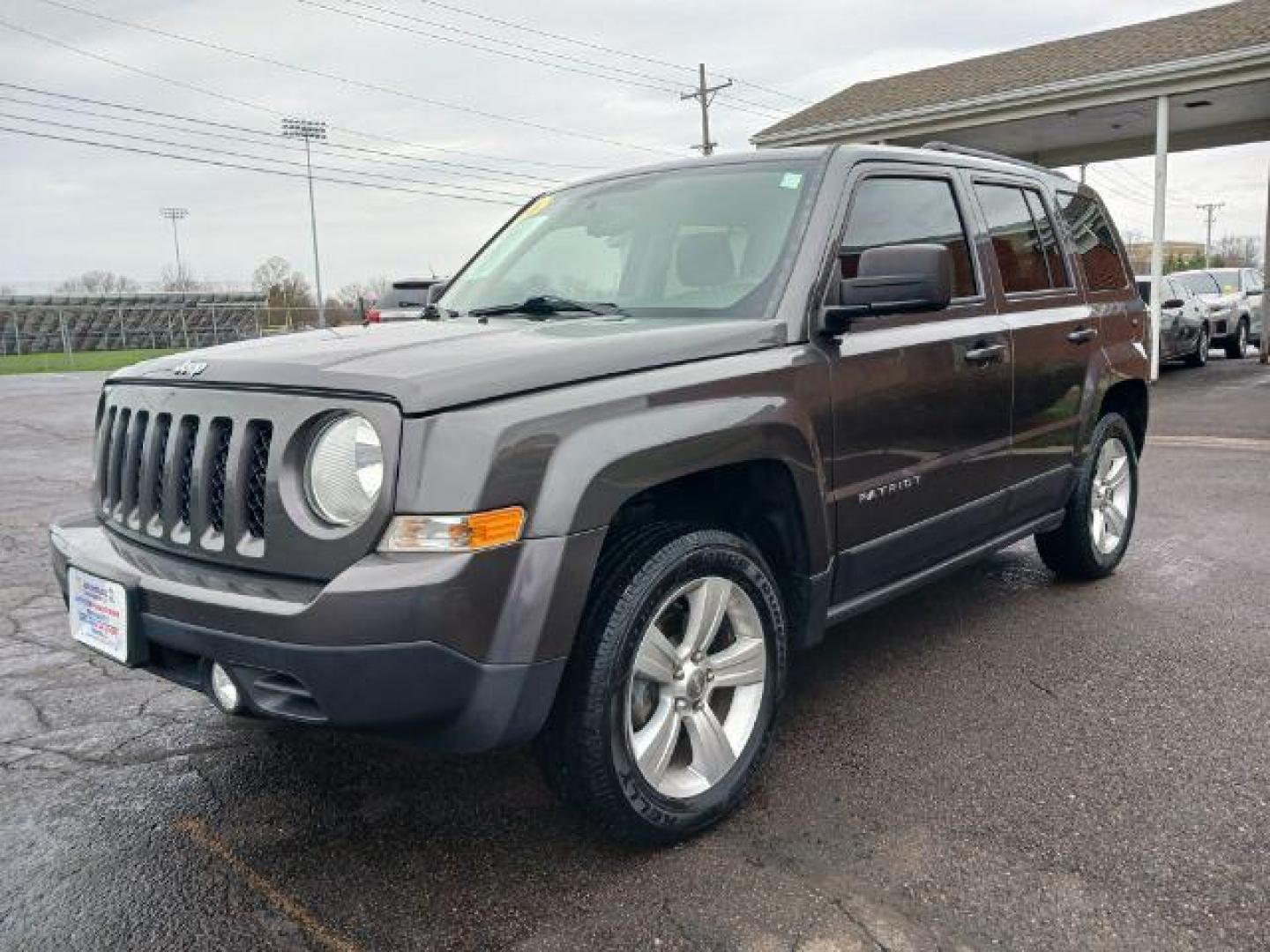 2016 Gray Jeep Patriot Latitude 4WD (1C4NJRFB8GD) with an 2.4L L4 DOHC 16V engine, located at 1184 Kauffman Ave, Fairborn, OH, 45324, (937) 908-9800, 39.807072, -84.030914 - Photo#2