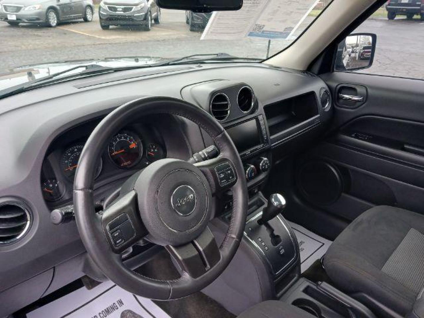 2016 Gray Jeep Patriot Latitude 4WD (1C4NJRFB8GD) with an 2.4L L4 DOHC 16V engine, located at 1184 Kauffman Ave, Fairborn, OH, 45324, (937) 908-9800, 39.807072, -84.030914 - Photo#6