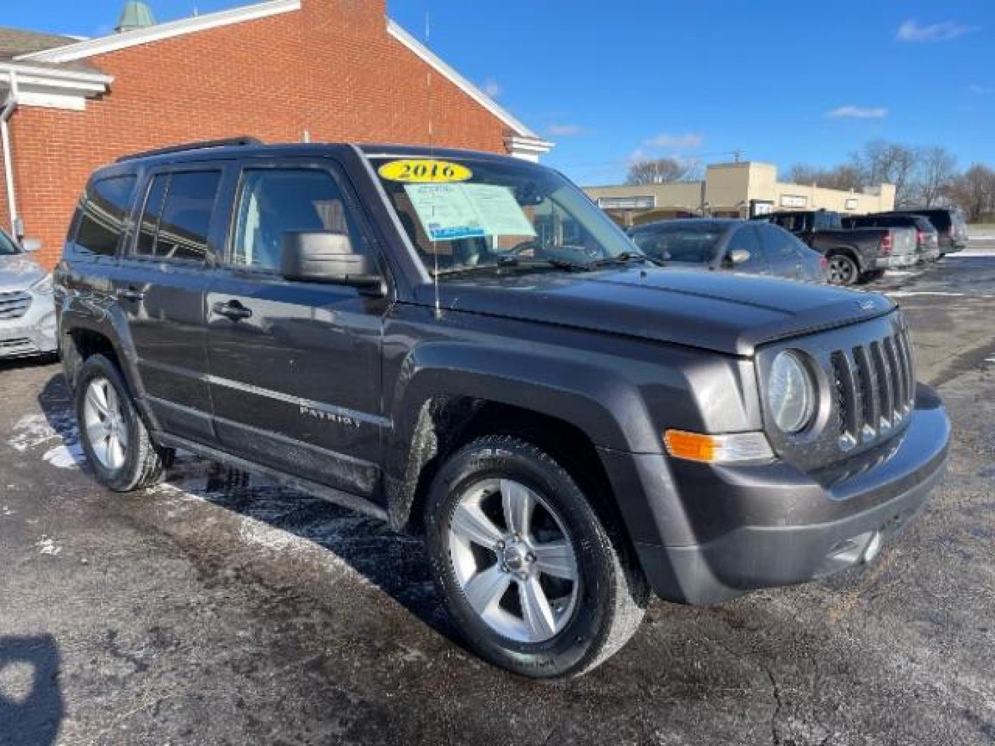 2016 Gray Jeep Patriot Latitude 4WD (1C4NJRFBXGD) with an 2.4L L4 DOHC 16V engine, located at 4508 South Dixie Dr, Moraine, OH, 45439, (937) 908-9800, 39.689976, -84.218452 - Photo#0