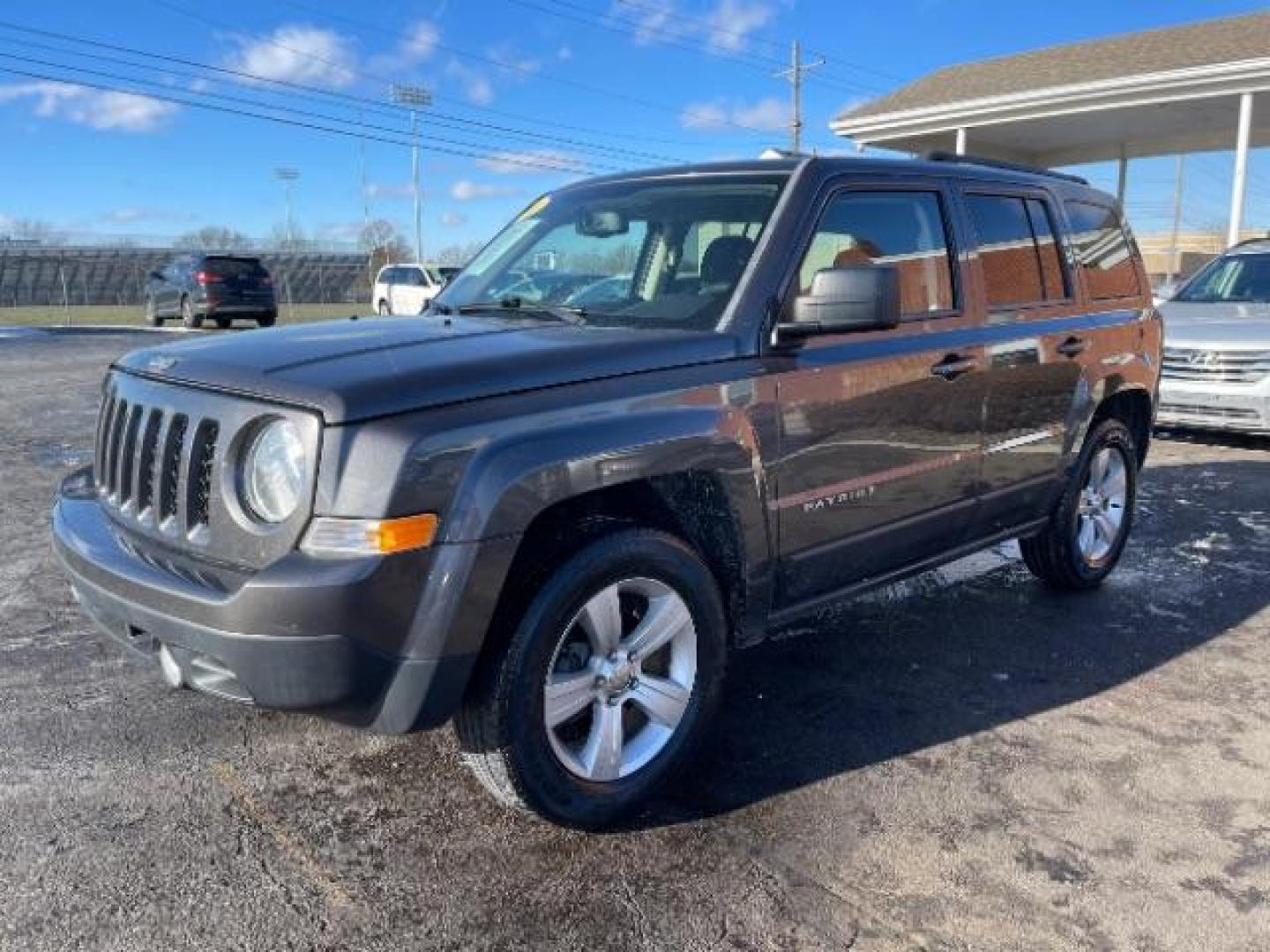 2016 Gray Jeep Patriot Latitude 4WD (1C4NJRFBXGD) with an 2.4L L4 DOHC 16V engine, located at 4508 South Dixie Dr, Moraine, OH, 45439, (937) 908-9800, 39.689976, -84.218452 - Photo#1