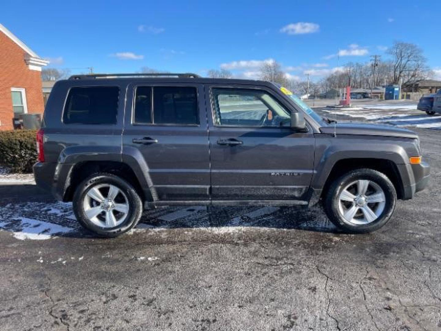 2016 Gray Jeep Patriot Latitude 4WD (1C4NJRFBXGD) with an 2.4L L4 DOHC 16V engine, located at 4508 South Dixie Dr, Moraine, OH, 45439, (937) 908-9800, 39.689976, -84.218452 - Photo#3