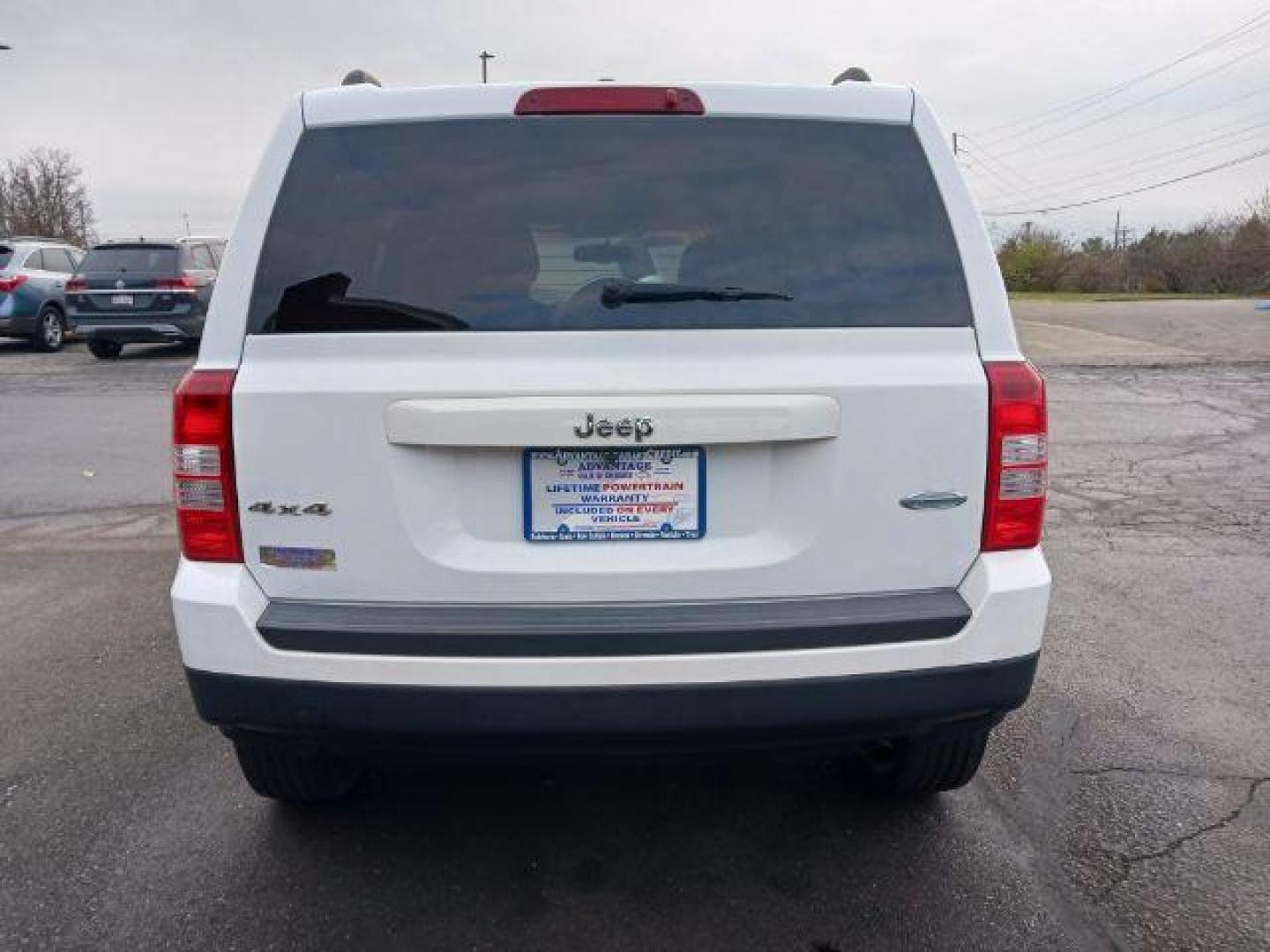 2016 White Jeep Patriot Latitude 4WD (1C4NJRFB7GD) with an 2.4L L4 DOHC 16V engine, located at 1951 S Dayton Lakeview Rd., New Carlisle, OH, 45344, (937) 908-9800, 39.890999, -84.050255 - Photo#4