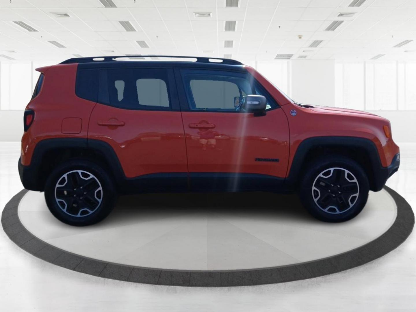 2016 Omaha Orange Jeep Renegade Trailhawk (ZACCJBCTXGP) with an 2.4L L4 DOHC 16V engine, 9-Speed Automatic transmission, located at 1230 East Main St, Xenia, OH, 45385, (937) 908-9800, 39.688026, -83.910172 - Photo#0