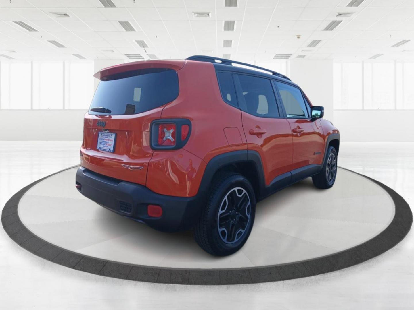 2016 Omaha Orange Jeep Renegade Trailhawk (ZACCJBCTXGP) with an 2.4L L4 DOHC 16V engine, 9-Speed Automatic transmission, located at 1230 East Main St, Xenia, OH, 45385, (937) 908-9800, 39.688026, -83.910172 - Photo#1