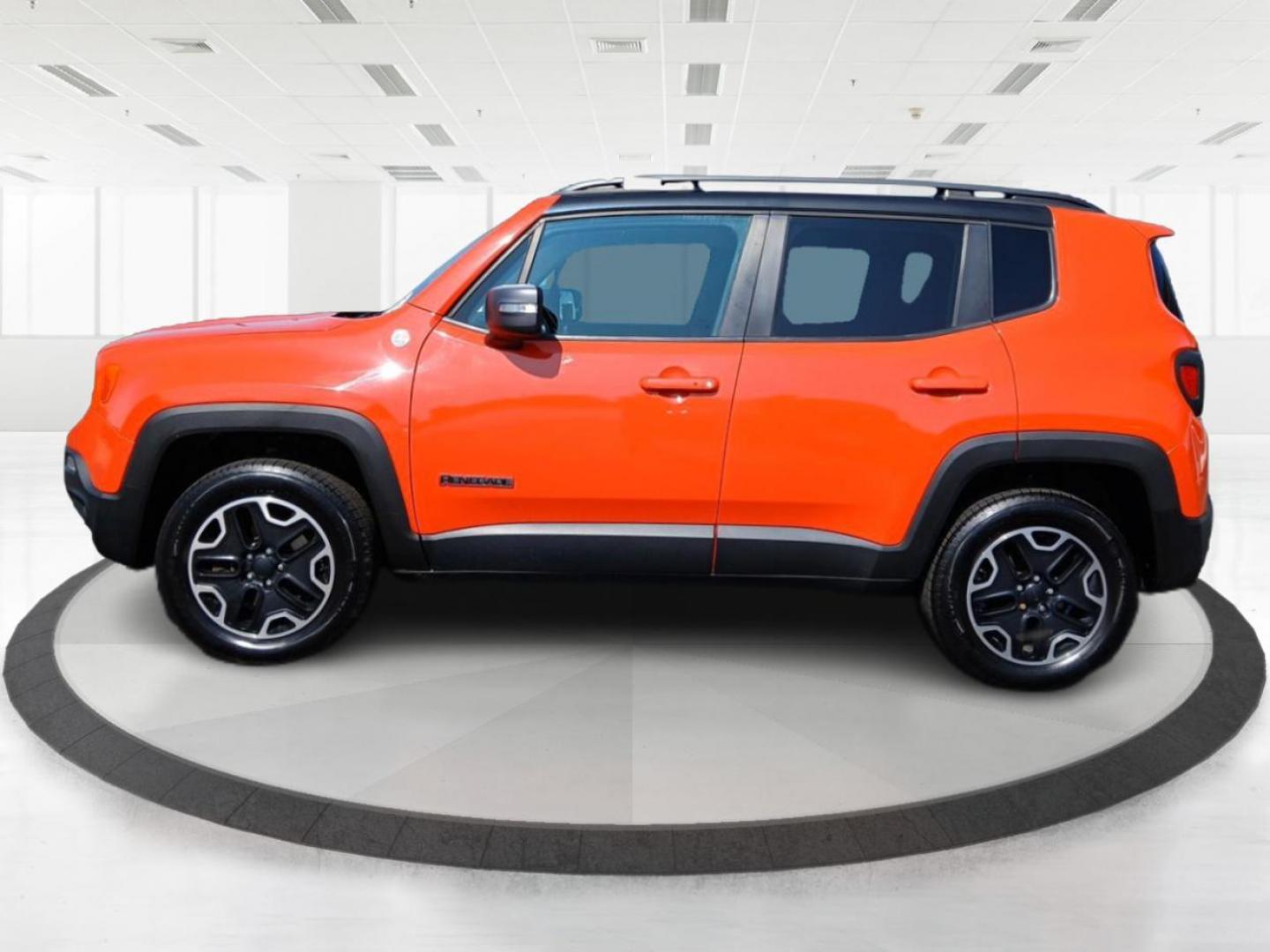 2016 Omaha Orange Jeep Renegade Trailhawk (ZACCJBCTXGP) with an 2.4L L4 DOHC 16V engine, 9-Speed Automatic transmission, located at 1230 East Main St, Xenia, OH, 45385, (937) 908-9800, 39.688026, -83.910172 - Photo#3