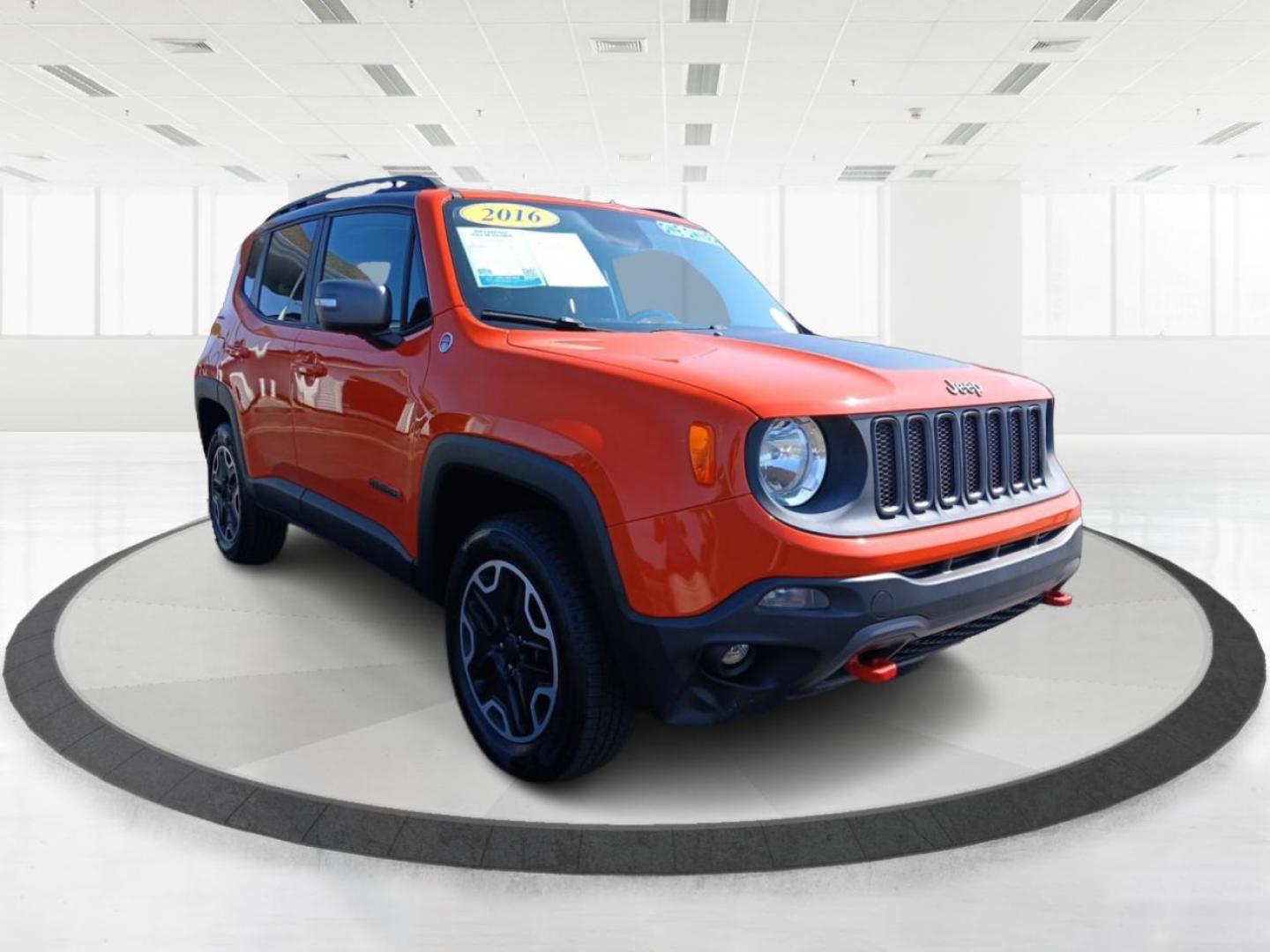 2016 Omaha Orange Jeep Renegade Trailhawk (ZACCJBCTXGP) with an 2.4L L4 DOHC 16V engine, 9-Speed Automatic transmission, located at 1230 East Main St, Xenia, OH, 45385, (937) 908-9800, 39.688026, -83.910172 - Photo#5