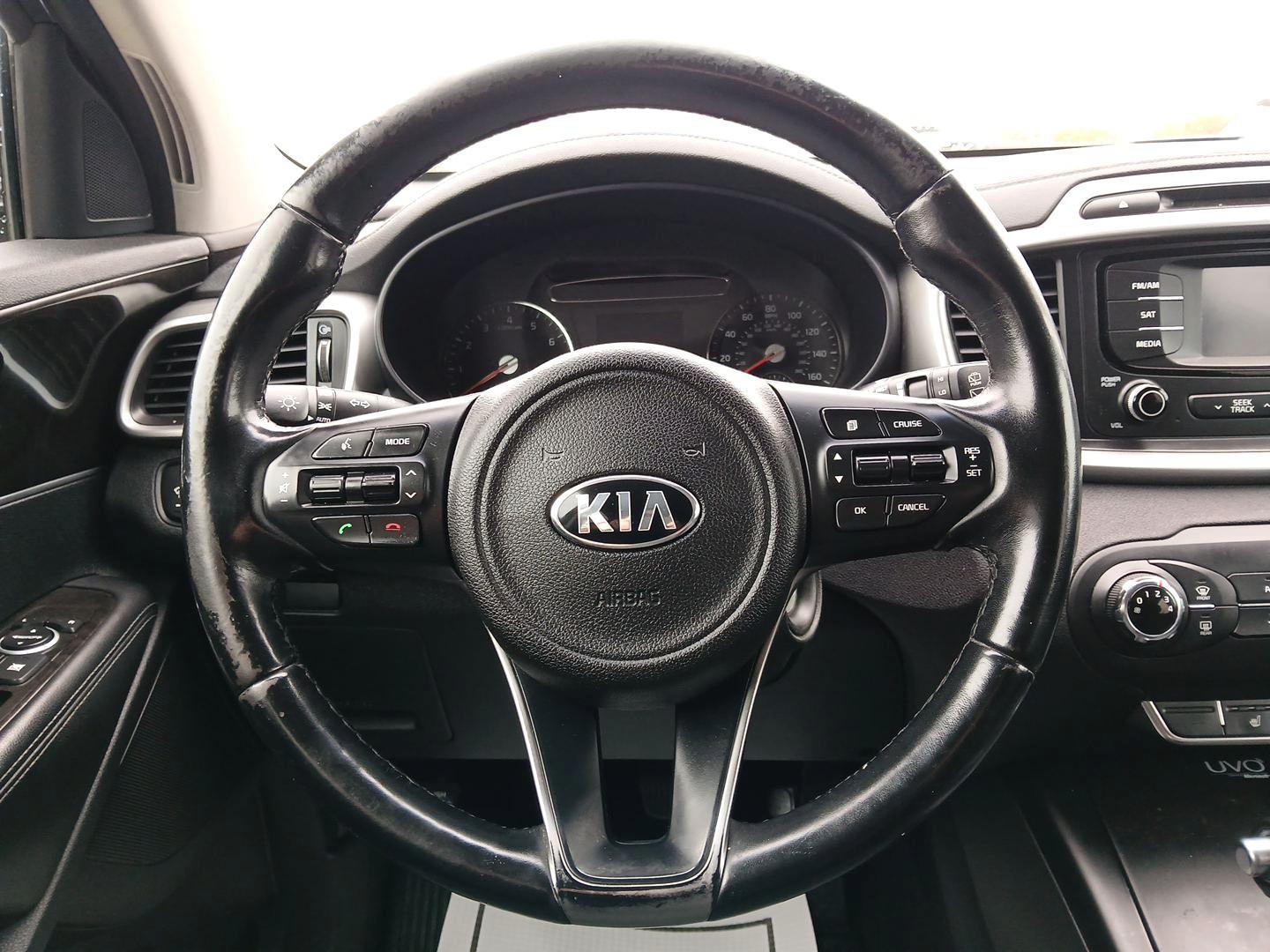 2016 Ebony Black Kia Sorento LX 2WD (5XYPG4A30GG) with an 2.4L L4 DOHC 16V engine, 6-Speed Automatic transmission, located at 1099 N County Rd 25A, Troy, OH, 45373, (937) 908-9800, 40.057079, -84.212883 - Photo#15