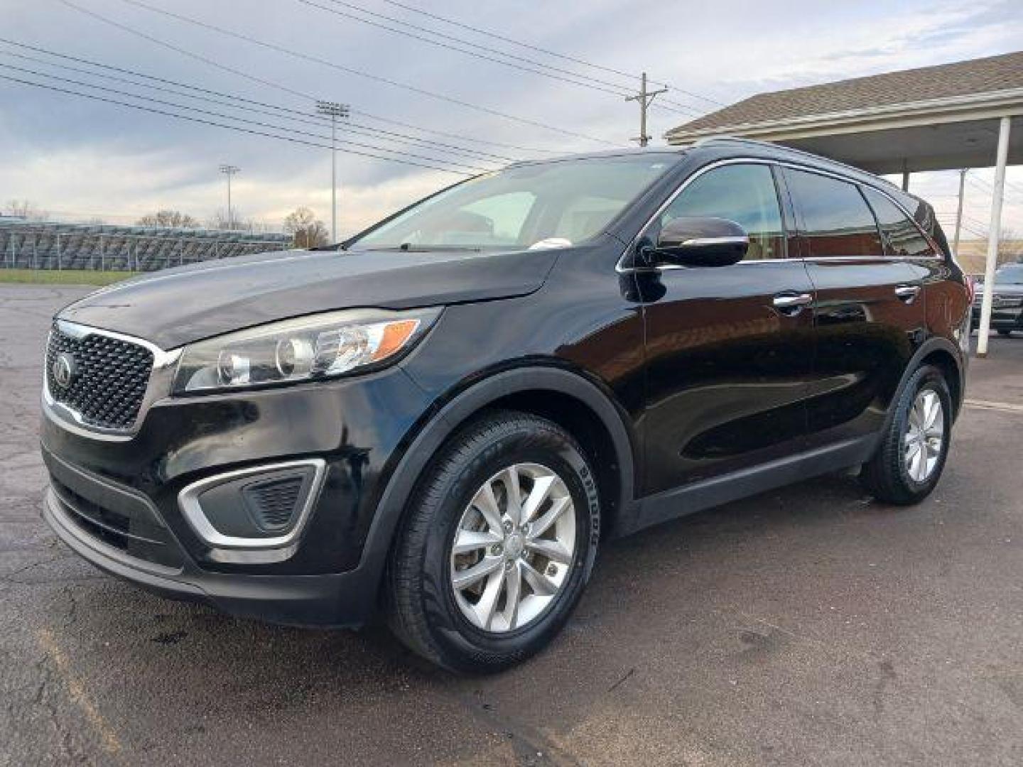 2016 Ebony Black Kia Sorento LX 2WD (5XYPG4A34GG) with an 2.4L L4 DOHC 16V engine, 6-Speed Automatic transmission, located at 880 E. National Road, Vandalia, OH, 45377, (937) 908-9800, 39.891918, -84.183594 - Photo#2