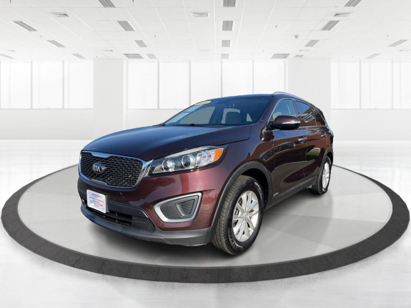 2016 Dark Cherry Kia Sorento LX AWD (5XYPGDA31GG) with an 2.4L L4 DOHC 16V engine, 6-Speed Automatic transmission, located at 880 E. National Road, Vandalia, OH, 45377, (937) 908-9800, 39.891918, -84.183594 - Photo#7