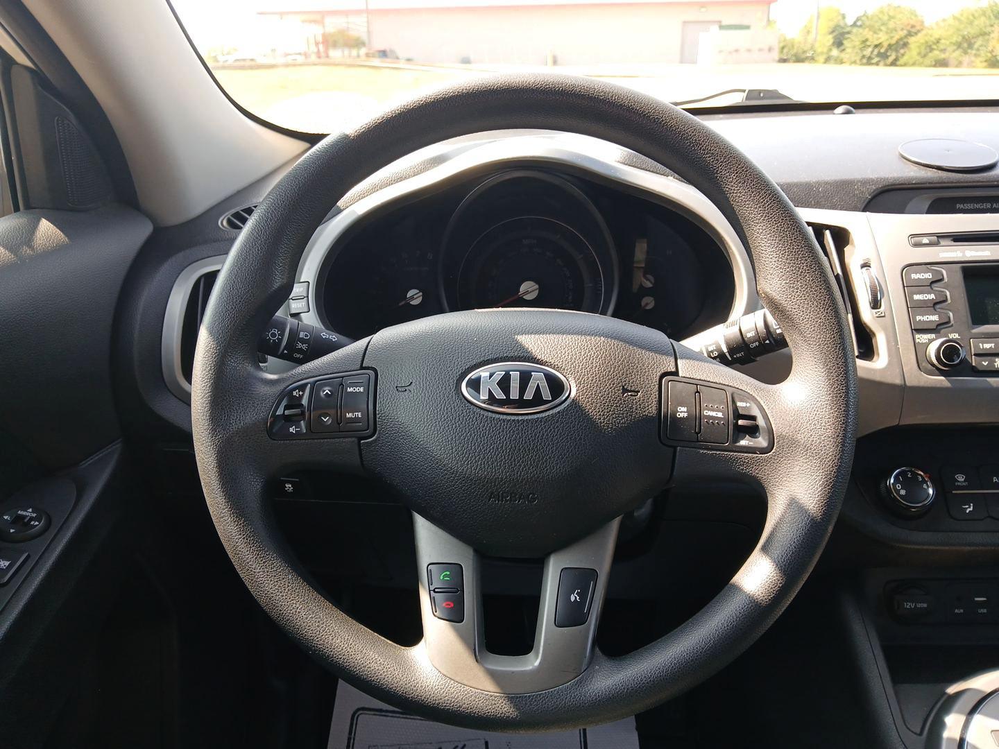 2016 Kia Sportage LX FWD (KNDPB3AC7G7) with an 2.4L V6 DOHC 24V engine, 6-Speed Automatic transmission, located at 1099 N County Rd 25A, Troy, OH, 45373, (937) 908-9800, 40.057079, -84.212883 - 2016 Kia Sportage LX FWD - Photo#15