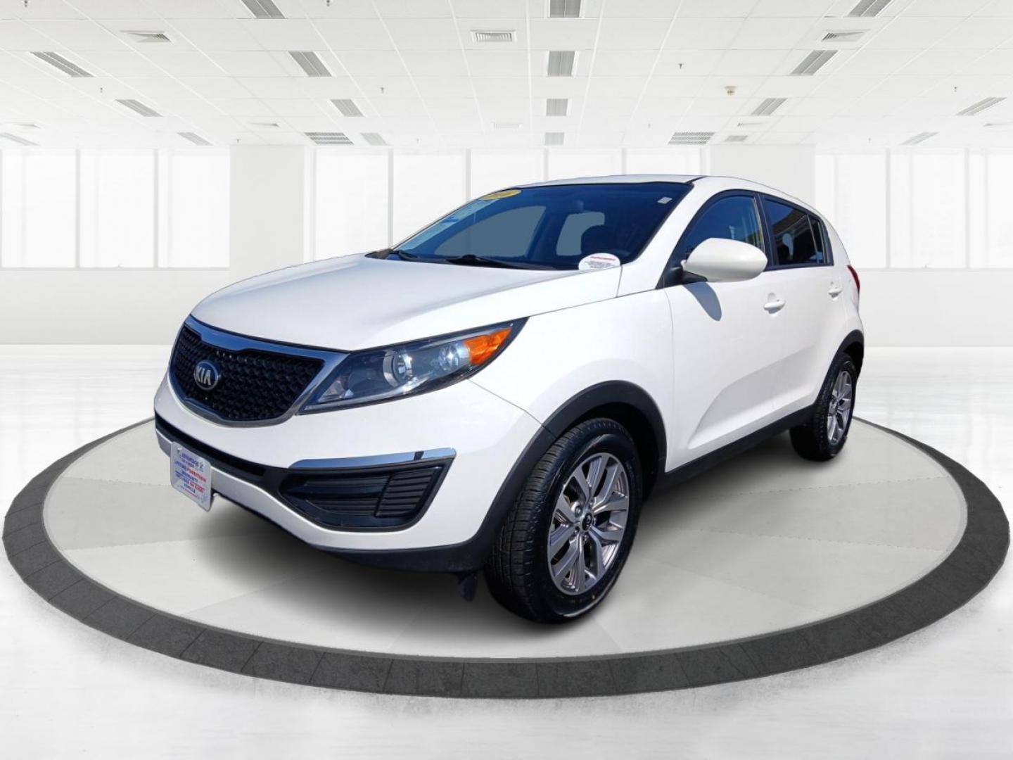 2016 Kia Sportage LX FWD (KNDPB3AC7G7) with an 2.4L V6 DOHC 24V engine, 6-Speed Automatic transmission, located at 1099 N County Rd 25A, Troy, OH, 45373, (937) 908-9800, 40.057079, -84.212883 - 2016 Kia Sportage LX FWD - Photo#7