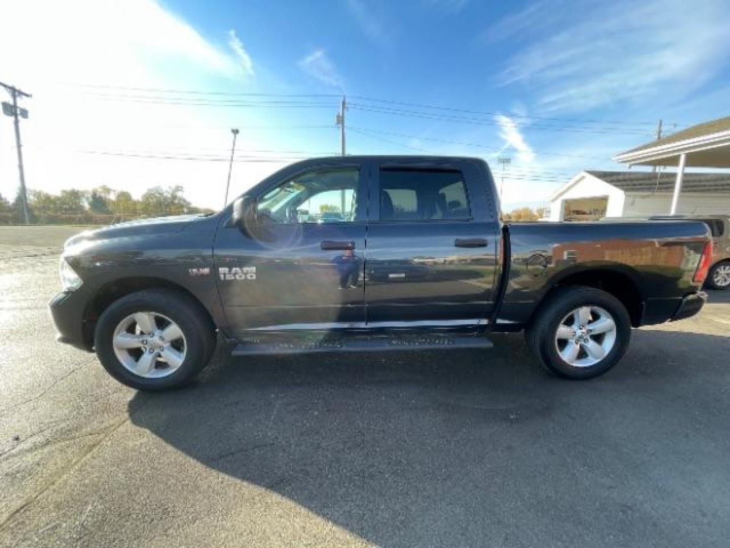 2016 Granite Crystal Metallic Clear Coat RAM 1500 Tradesman Crew Cab SWB 4WD (3C6RR7KTXGG) with an 5.7L V8 OHV 16V engine, 8-Speed Automatic transmission, located at 401 Woodman Dr, Riverside, OH, 45431, (937) 908-9800, 39.760899, -84.123421 - Photo#2