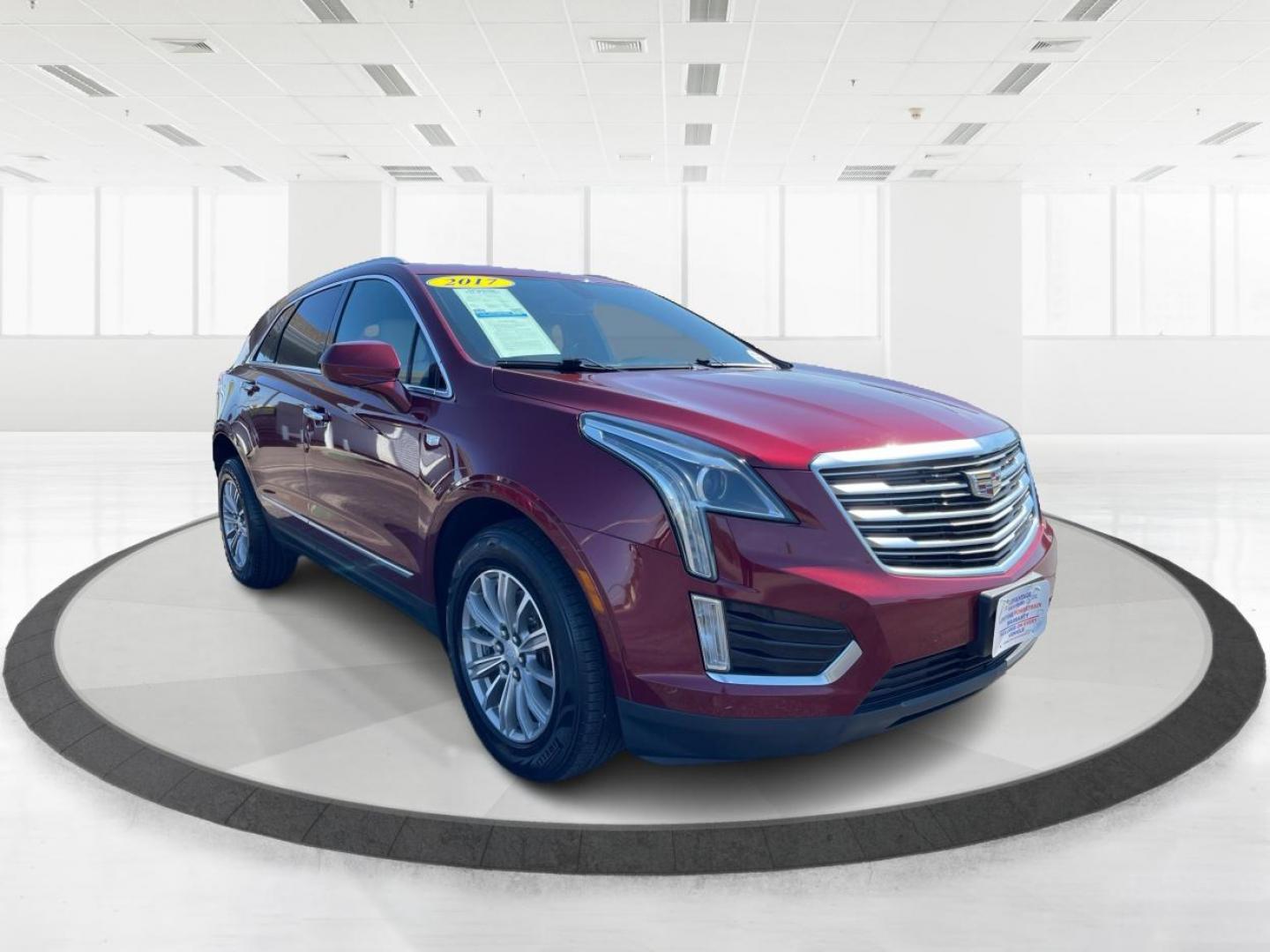 2017 Red Passion Tintcoat Cadillac XT5 Luxury AWD (1GYKNDRS4HZ) with an 3.6L V6 DOHC 24V engine, 8-Speed Automatic transmission, located at 1184 Kauffman Ave, Fairborn, OH, 45324, (937) 908-9800, 39.807072, -84.030914 - Photo#0