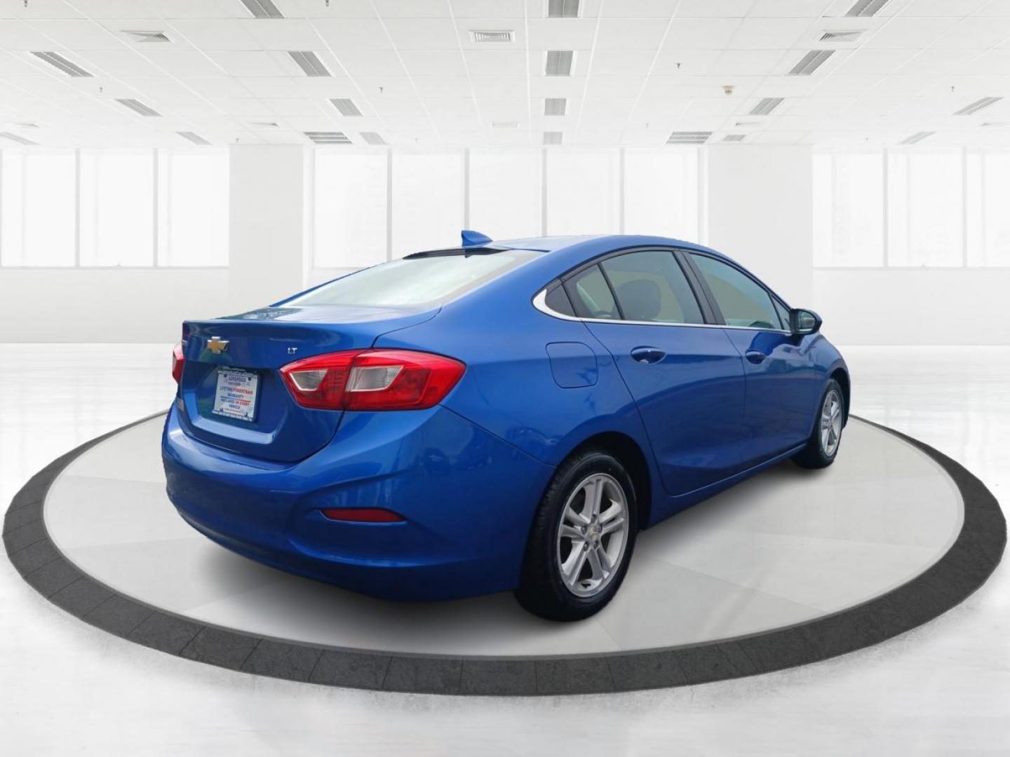 2017 Kinetic Blue Metallic Chevrolet Cruze (1G1BE5SM3H7) with an 1.4L L4 DOHC 16V TURBO engine, 6-Speed Automatic transmission, located at 1230 East Main St, Xenia, OH, 45385, (937) 908-9800, 39.688026, -83.910172 - Photo#2