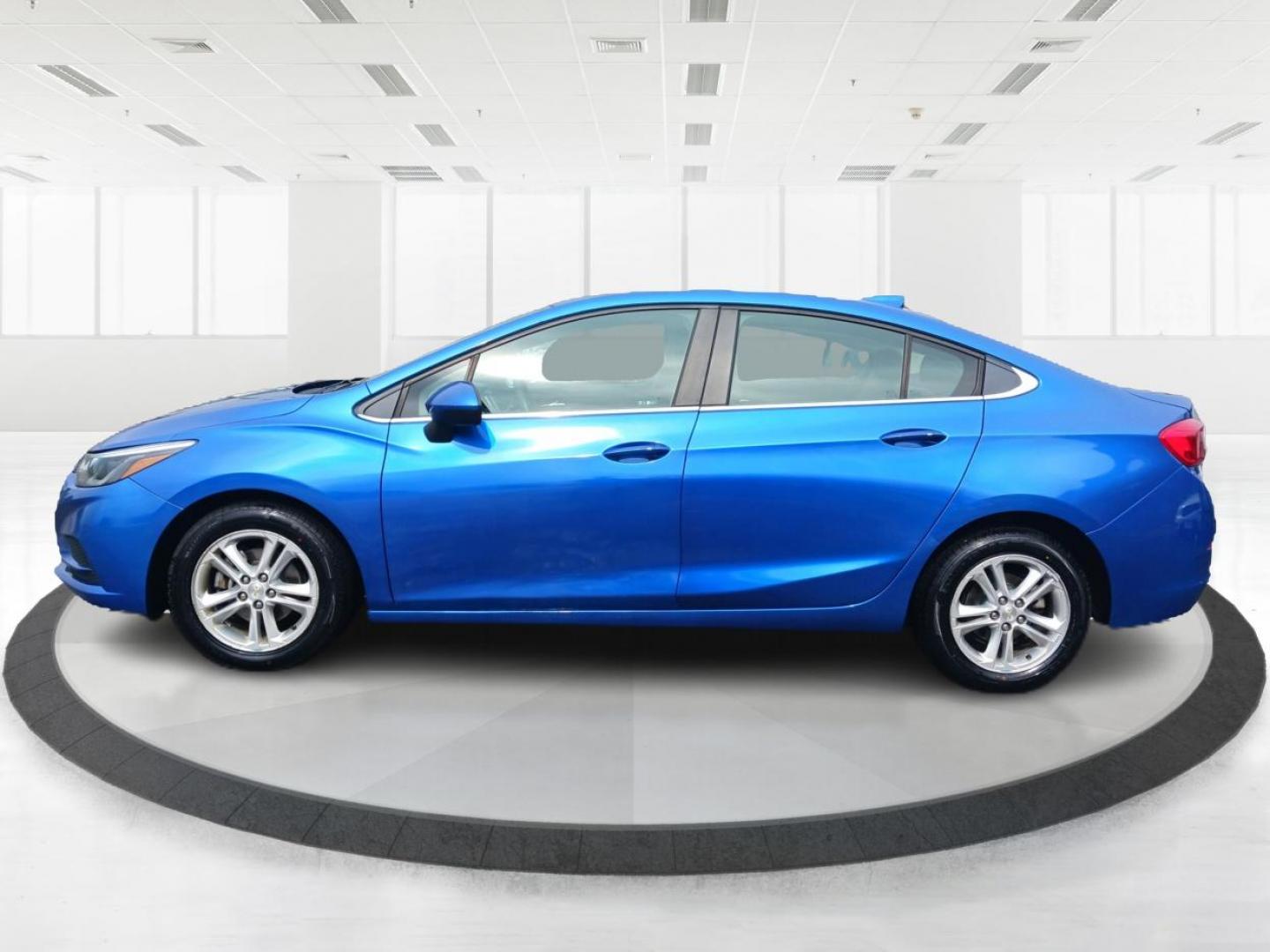 2017 Kinetic Blue Metallic Chevrolet Cruze LT Auto (1G1BE5SM3H7) with an 1.4L L4 DOHC 16V TURBO engine, 6-Speed Automatic transmission, located at 1230 East Main St, Xenia, OH, 45385, (937) 908-9800, 39.688026, -83.910172 - Photo#5