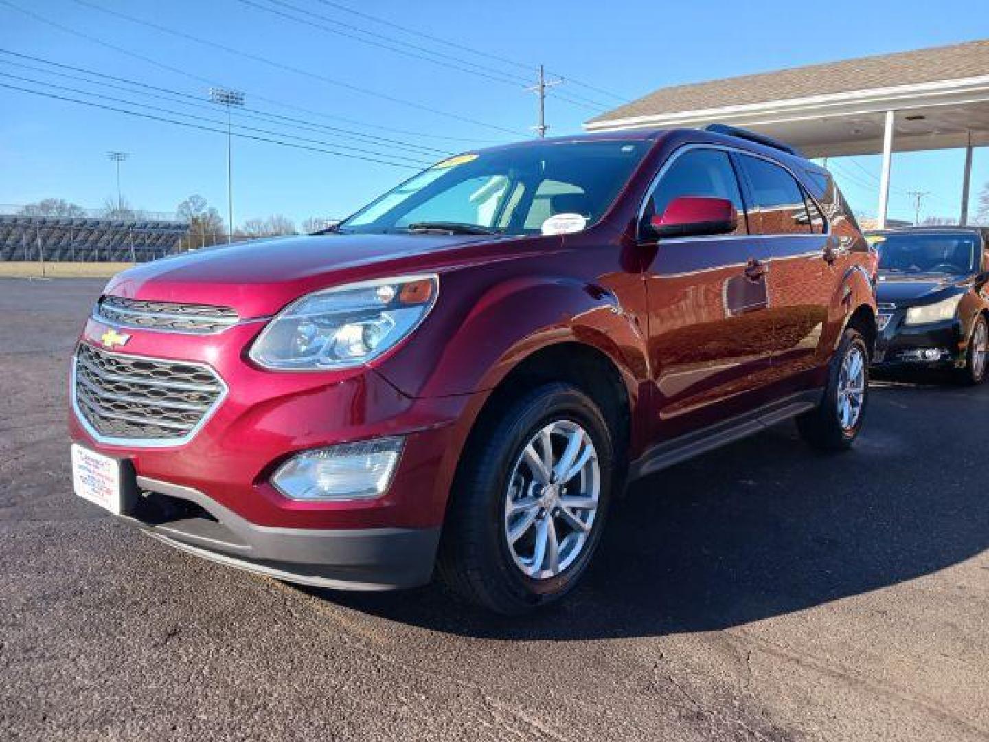 2017 Siren Red Tintcoat Chevrolet Equinox LT AWD (2GNFLFEKXH6) with an 2.4L L4 DOHC 16V FFV engine, 6-Speed Automatic transmission, located at 4508 South Dixie Dr, Moraine, OH, 45439, (937) 908-9800, 39.689976, -84.218452 - Photo#2