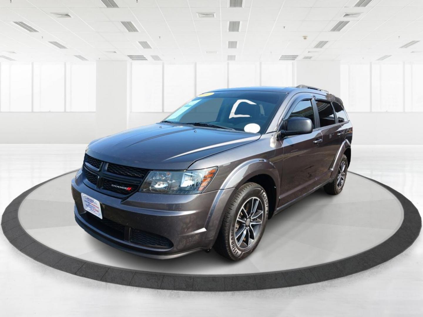 2017 Granite Metallic Clear Coat Dodge Journey SE (3C4PDCAB5HT) with an 2.4L L4 DOHC 16V engine, 4-Speed Automatic transmission, located at 1184 Kauffman Ave, Fairborn, OH, 45324, (937) 908-9800, 39.807072, -84.030914 - Photo#4