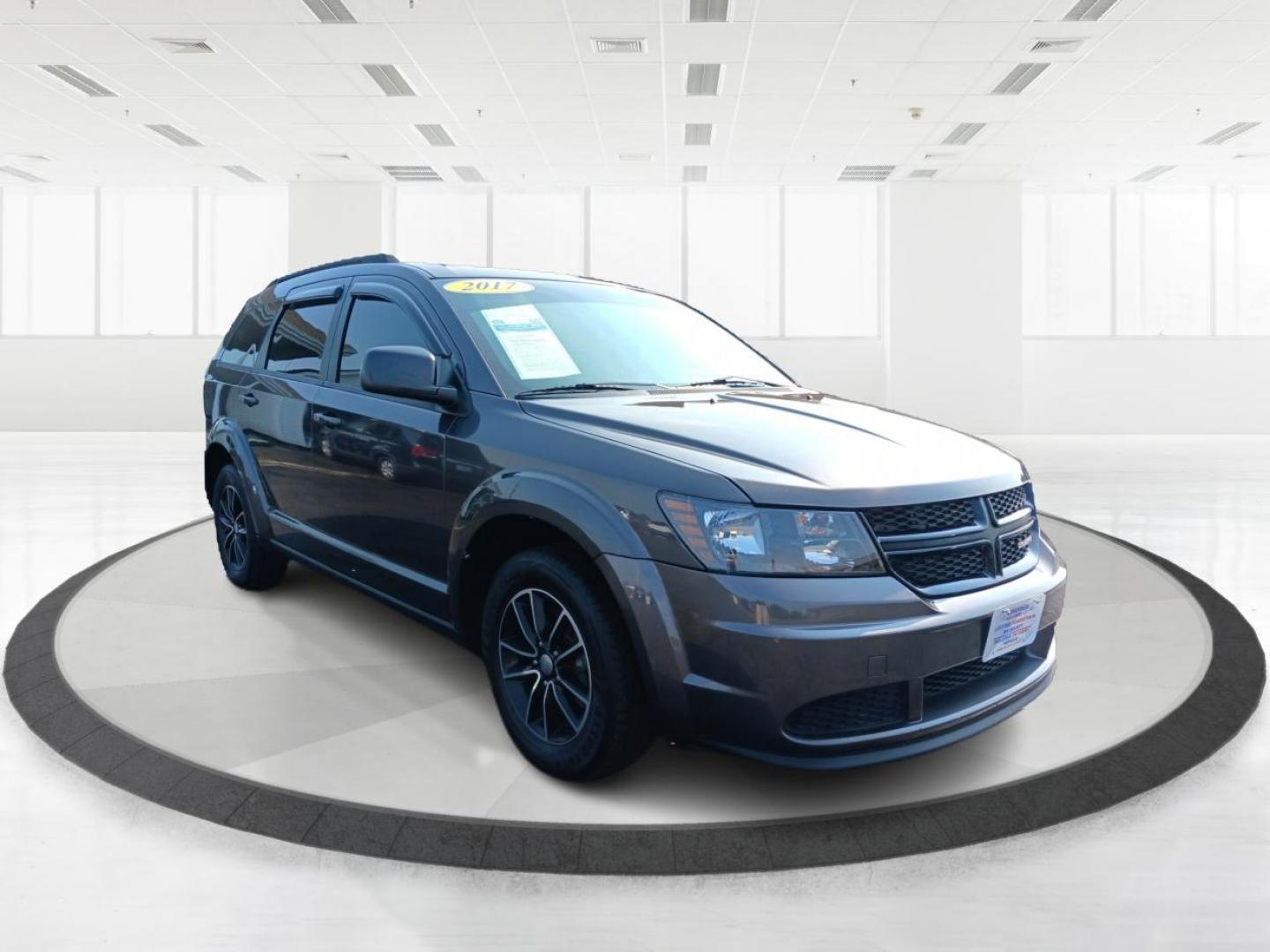 2017 Granite Metallic Clear Coat Dodge Journey SE (3C4PDCAB5HT) with an 2.4L L4 DOHC 16V engine, 4-Speed Automatic transmission, located at 1184 Kauffman Ave, Fairborn, OH, 45324, (937) 908-9800, 39.807072, -84.030914 - Photo#5