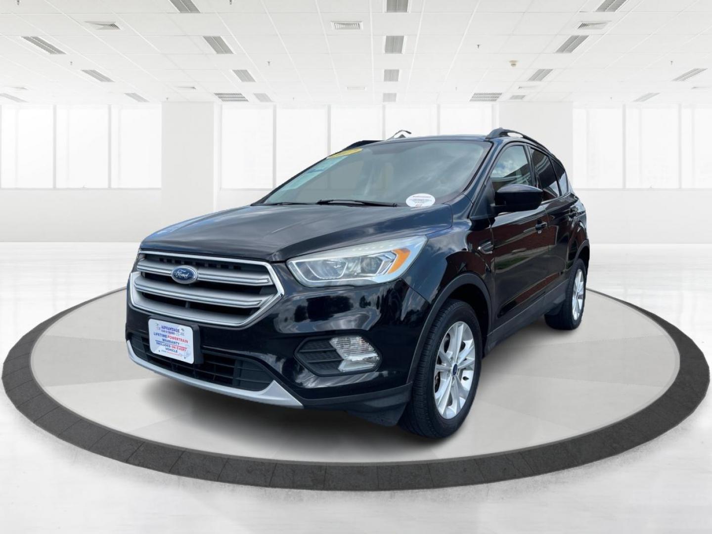 2017 Shadow Black Ford Escape SE 4WD (1FMCU9GD9HU) with an 1.5L L4 DOHC 16V engine, 6-Speed Automatic transmission, located at 1184 Kauffman Ave, Fairborn, OH, 45324, (937) 908-9800, 39.807072, -84.030914 - Photo#7