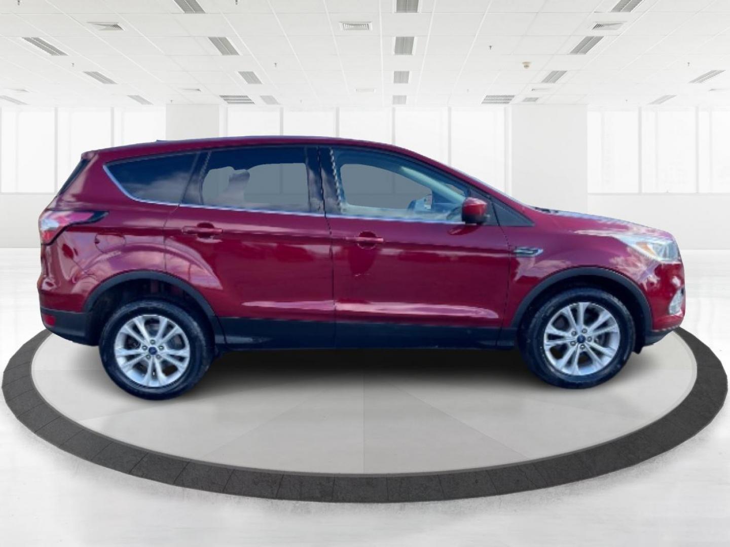 2017 Ruby Red Metallic Tinted Clearcoat Ford Escape (1FMCU9GD4HU) with an 1.5L L4 DOHC 16V engine, 6-Speed Automatic transmission, located at 1230 East Main St, Xenia, OH, 45385, (937) 908-9800, 39.688026, -83.910172 - Photo#1