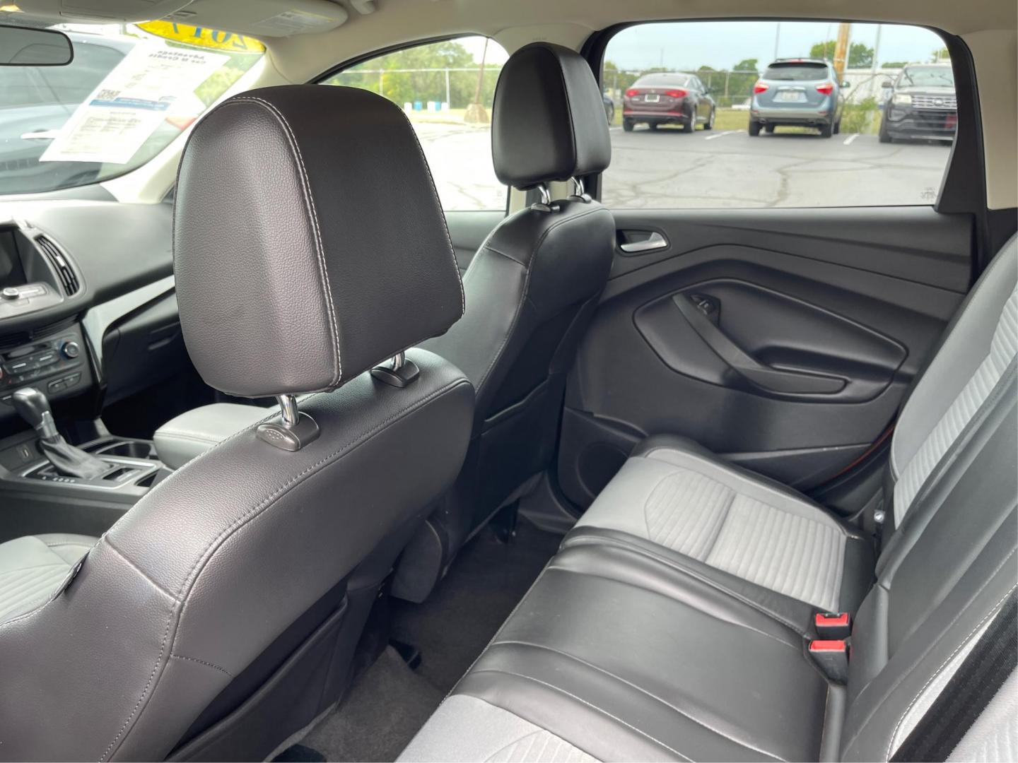 2017 Ruby Red Metallic Tinted Clearcoat Ford Escape (1FMCU9GD9HU) with an 1.5L L4 DOHC 16V engine, 6-Speed Automatic transmission, located at 4508 South Dixie Dr, Moraine, OH, 45439, (937) 908-9800, 39.689976, -84.218452 - Photo#9