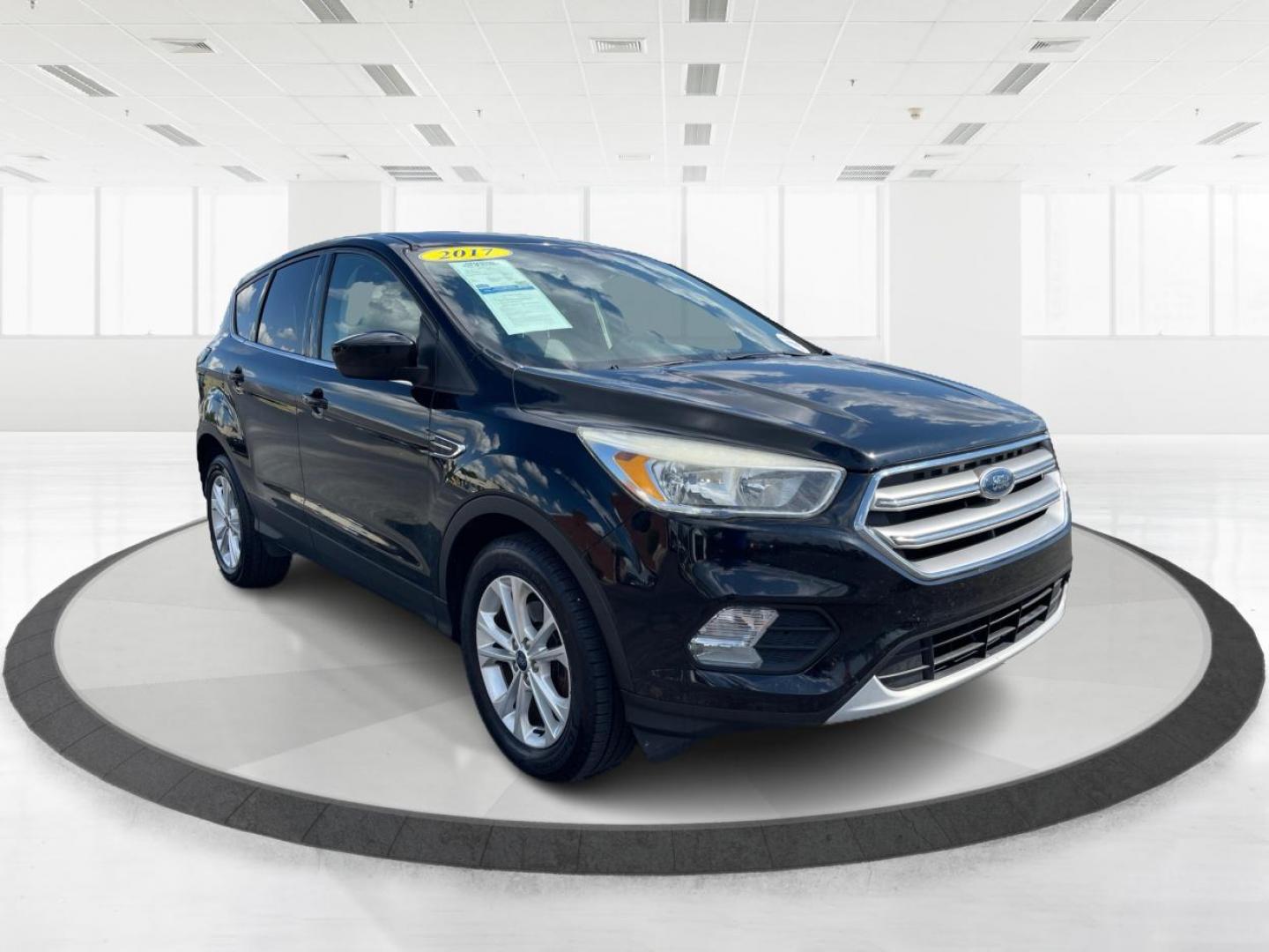 2017 Shadow Black Ford Escape SE FWD (1FMCU0GD6HU) with an 1.5L L4 DOHC 16V engine, 6-Speed Automatic transmission, located at 1230 East Main St, Xenia, OH, 45385, (937) 908-9800, 39.688026, -83.910172 - Photo#0