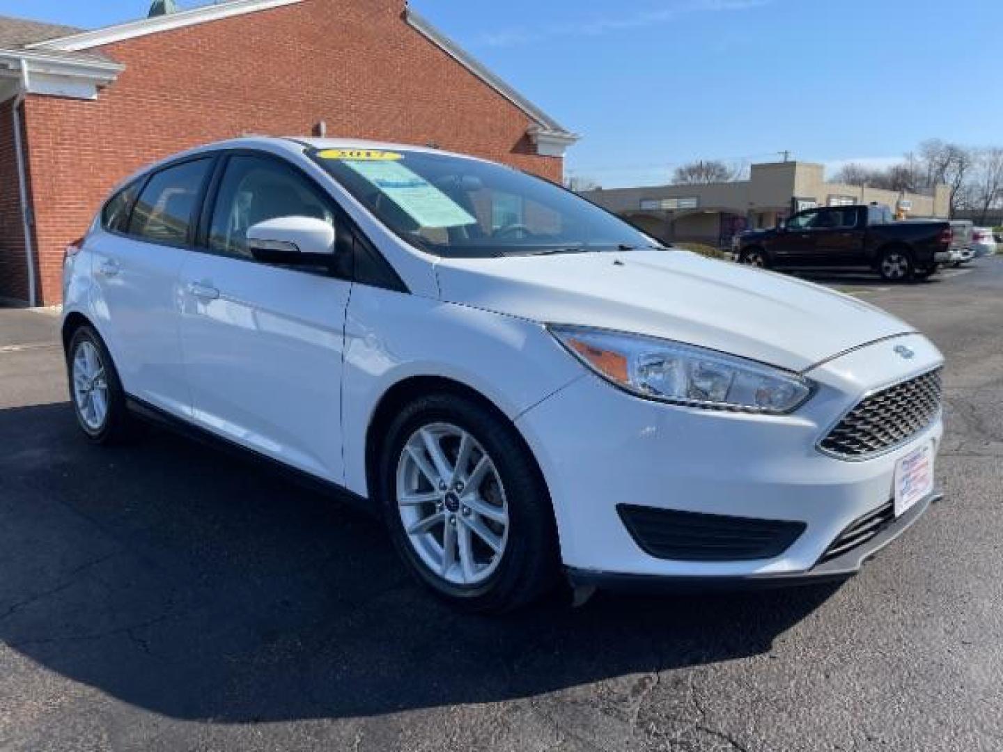 2017 Oxford White Ford Focus SE Hatch (1FADP3K22HL) with an 2.0L L4 DOHC 16V engine, located at 1951 S Dayton Lakeview Rd., New Carlisle, OH, 45344, (937) 908-9800, 39.890999, -84.050255 - Photo#0