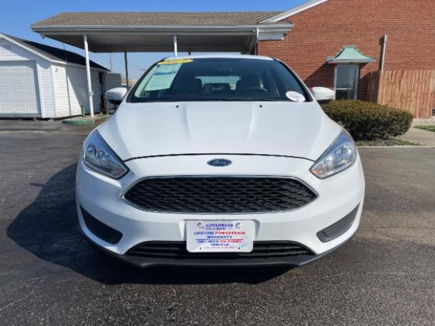 2017 Oxford White Ford Focus SE Hatch (1FADP3K22HL) with an 2.0L L4 DOHC 16V engine, located at 1951 S Dayton Lakeview Rd., New Carlisle, OH, 45344, (937) 908-9800, 39.890999, -84.050255 - Photo#2