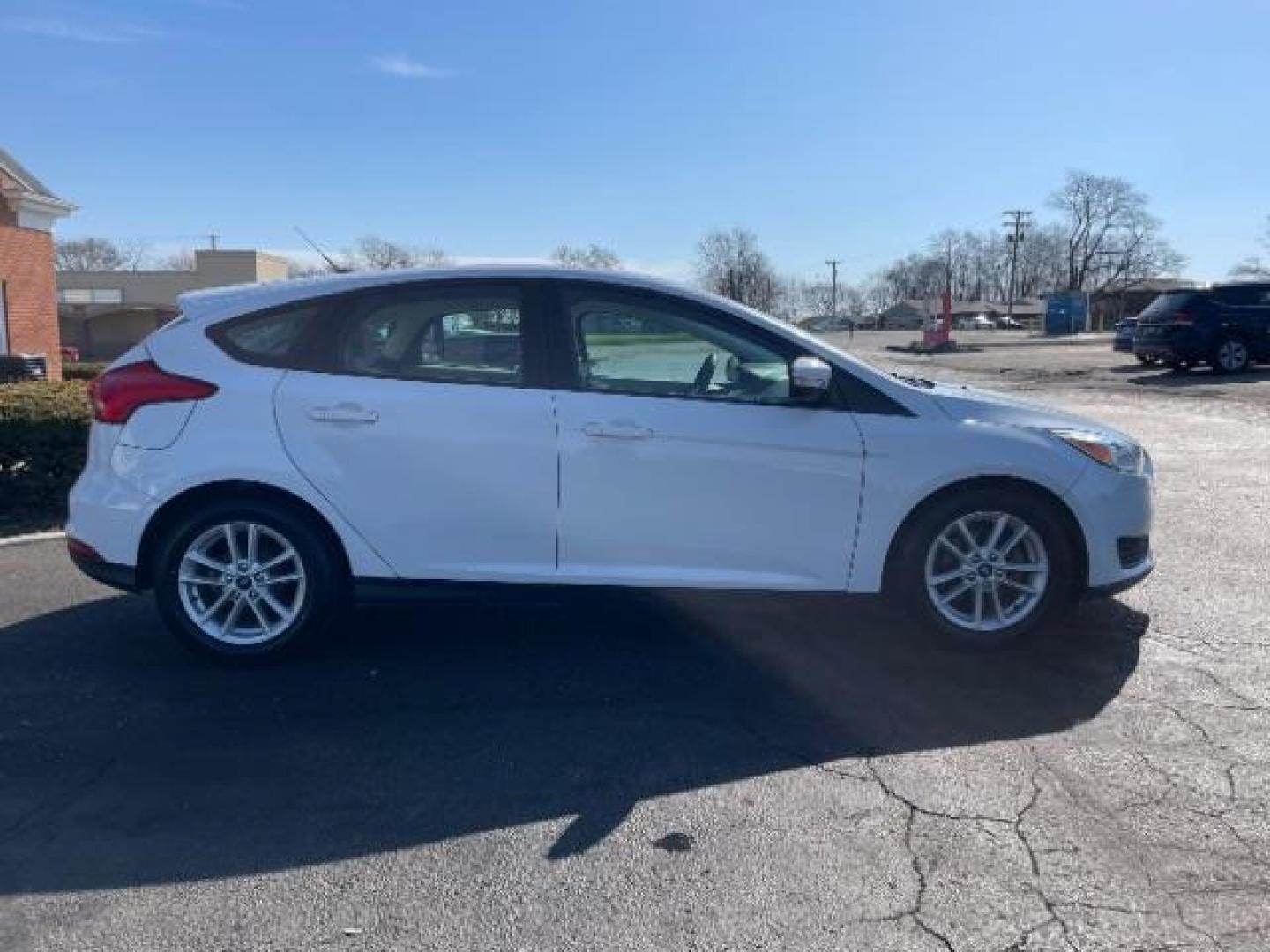 2017 Oxford White Ford Focus SE Hatch (1FADP3K22HL) with an 2.0L L4 DOHC 16V engine, located at 1951 S Dayton Lakeview Rd., New Carlisle, OH, 45344, (937) 908-9800, 39.890999, -84.050255 - Photo#5