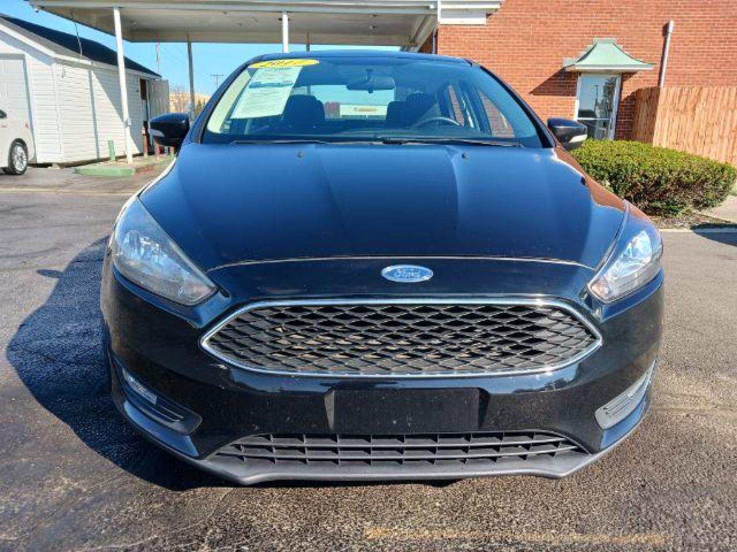 2017 Shadow Black Ford Focus SEL Sedan (1FADP3H2XHL) with an 2.0L L4 DOHC 16V engine, located at 880 E. National Road, Vandalia, OH, 45377, (937) 908-9800, 39.891918, -84.183594 - Photo#1