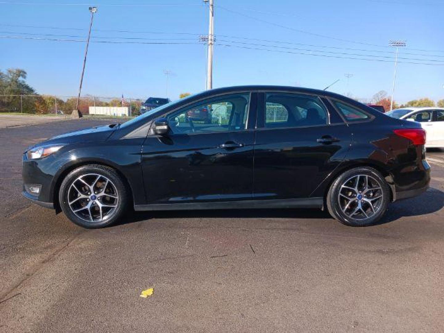 2017 Shadow Black Ford Focus SEL Sedan (1FADP3H2XHL) with an 2.0L L4 DOHC 16V engine, located at 880 E. National Road, Vandalia, OH, 45377, (937) 908-9800, 39.891918, -84.183594 - Photo#3