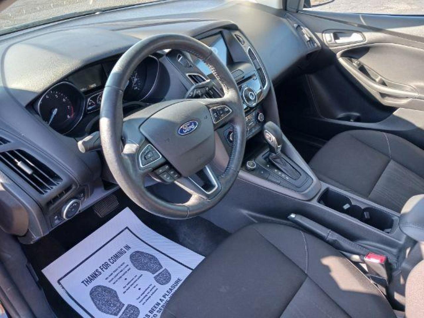 2017 Shadow Black Ford Focus SEL Sedan (1FADP3H2XHL) with an 2.0L L4 DOHC 16V engine, located at 880 E. National Road, Vandalia, OH, 45377, (937) 908-9800, 39.891918, -84.183594 - Photo#6