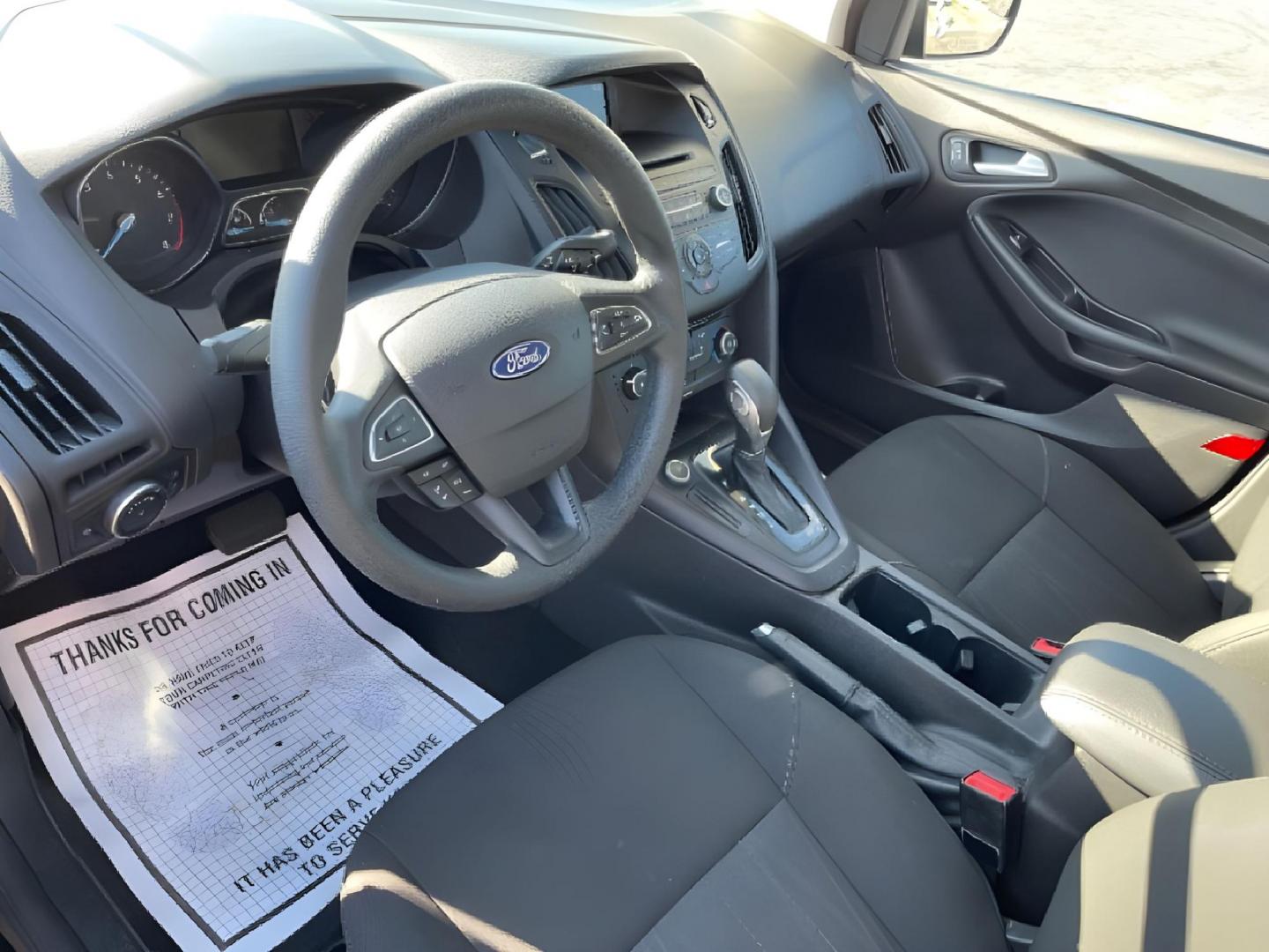 2017 Shadow Black Ford Focus (1FADP3F20HL) with an 2.0L L4 DOHC 16V engine, located at 1951 S Dayton Lakeview Rd., New Carlisle, OH, 45344, (937) 908-9800, 39.890999, -84.050255 - Photo#4