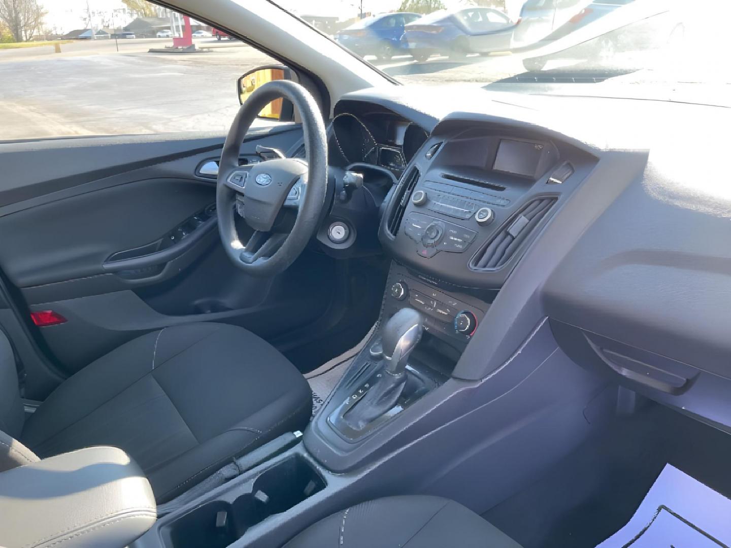 2017 Shadow Black Ford Focus (1FADP3F20HL) with an 2.0L L4 DOHC 16V engine, located at 1951 S Dayton Lakeview Rd., New Carlisle, OH, 45344, (937) 908-9800, 39.890999, -84.050255 - Photo#6