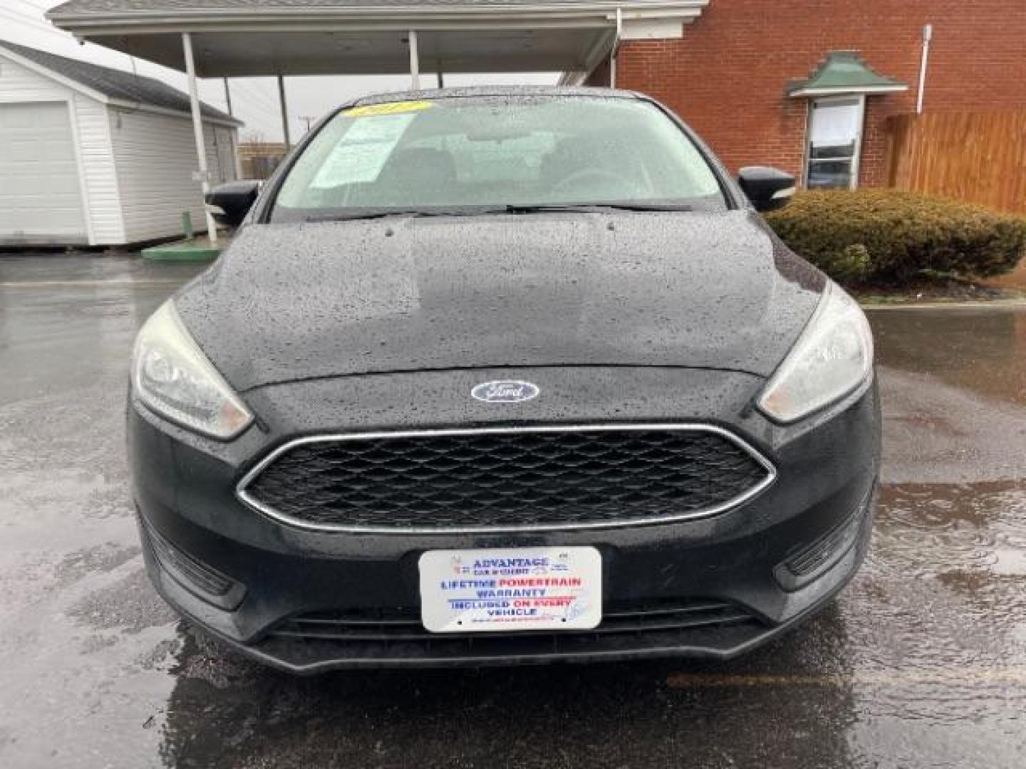 2017 Shadow Black Ford Focus SE Sedan (1FADP3F23HL) with an 2.0L L4 DOHC 16V engine, located at 1099 N County Rd 25A, Troy, OH, 45373, (937) 908-9800, 40.057079, -84.212883 - Photo#2