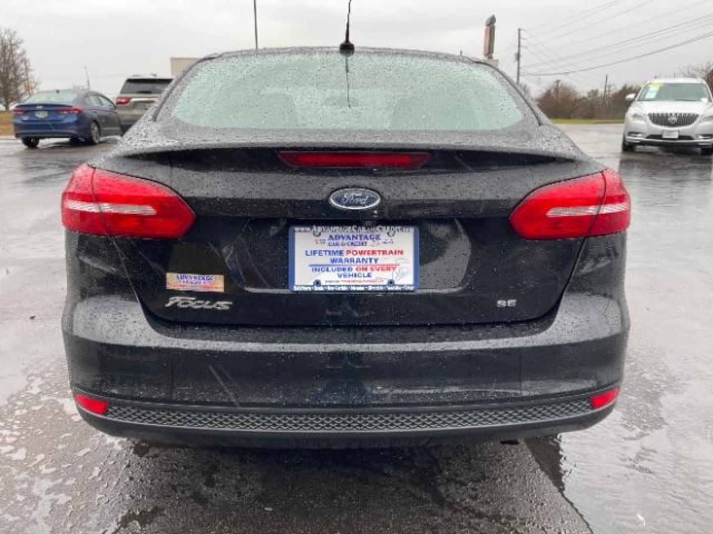 2017 Shadow Black Ford Focus SE Sedan (1FADP3F23HL) with an 2.0L L4 DOHC 16V engine, located at 1099 N County Rd 25A, Troy, OH, 45373, (937) 908-9800, 40.057079, -84.212883 - Photo#3