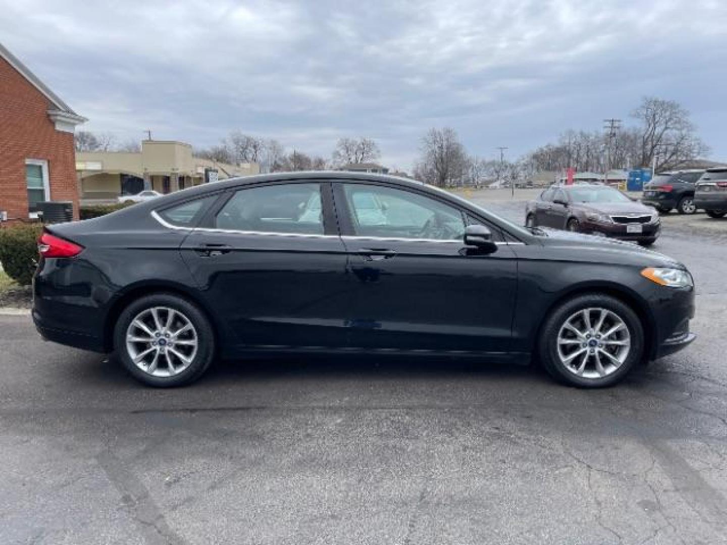 2017 Shadow Black Ford Fusion SE (3FA6P0HD7HR) with an 1.5L L4 DOHC 16V engine, 6-Speed Automatic transmission, located at 401 Woodman Dr, Riverside, OH, 45431, (937) 908-9800, 39.760899, -84.123421 - Photo#5