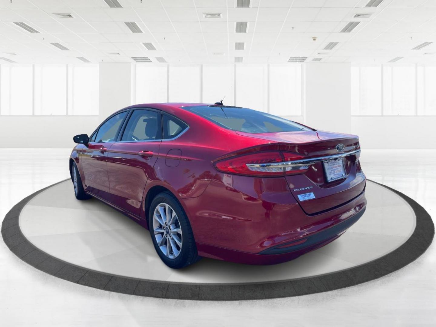 2017 Ruby Red Metallic Tinted Clearcoat Ford Fusion SE (3FA6P0H74HR) with an 2.5L L4 DOHC 16V engine, 6-Speed Automatic transmission, located at 1184 Kauffman Ave, Fairborn, OH, 45324, (937) 908-9800, 39.807072, -84.030914 - Photo#4