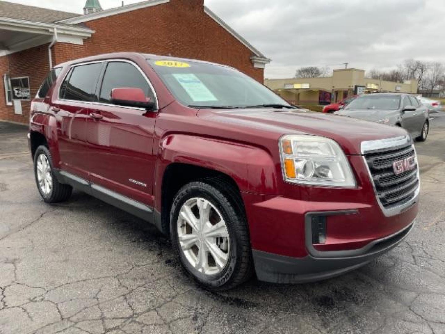 2017 Crimson Red Tintcoat GMC Terrain SLE2 AWD (2GKFLSEKXH6) with an 2.4L L4 DOHC 16V engine, 6-Speed Automatic transmission, located at 1099 N County Rd 25A, Troy, OH, 45373, (937) 908-9800, 40.057079, -84.212883 - Photo#0