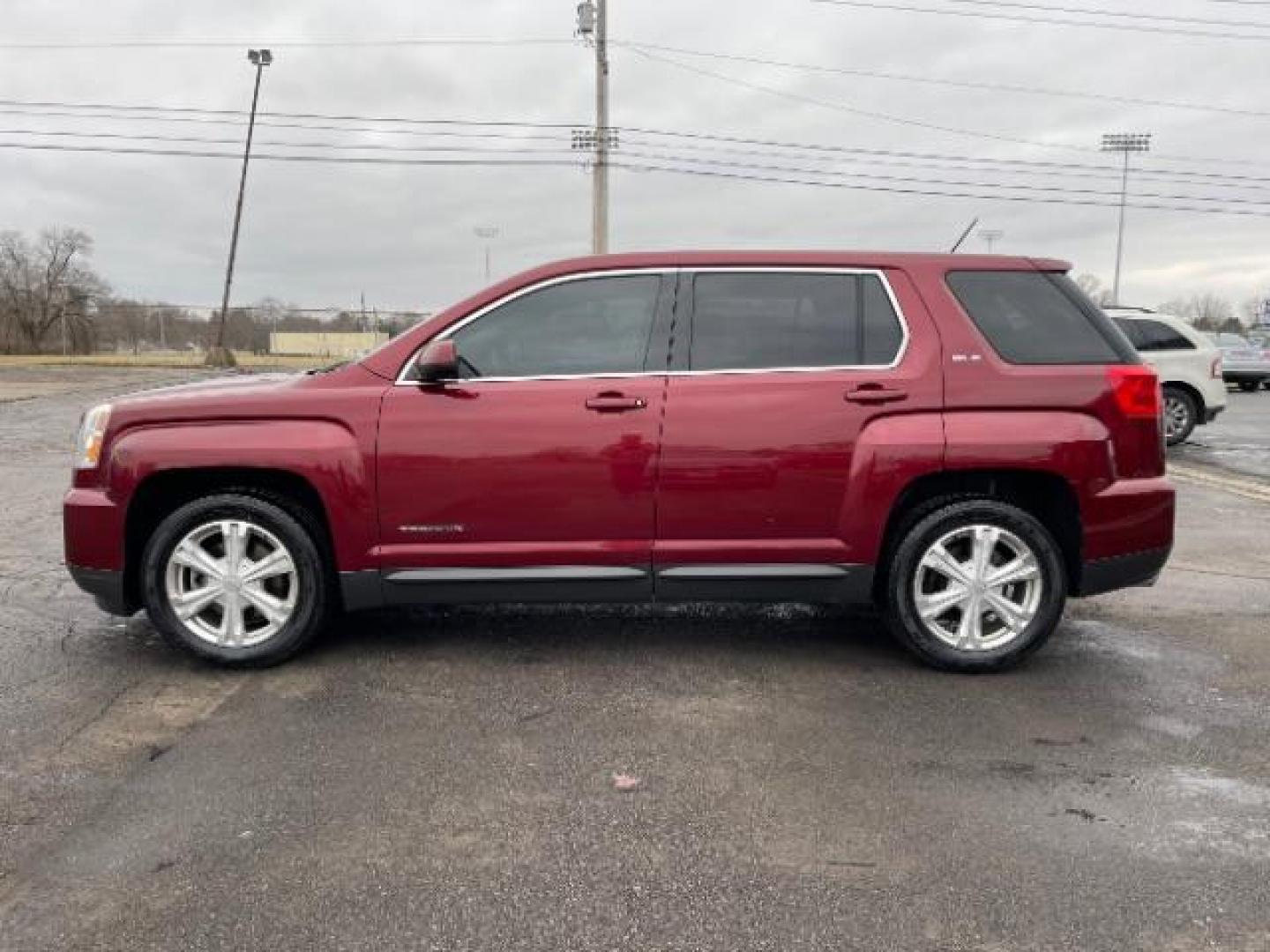 2017 Crimson Red Tintcoat GMC Terrain SLE2 AWD (2GKFLSEKXH6) with an 2.4L L4 DOHC 16V engine, 6-Speed Automatic transmission, located at 1099 N County Rd 25A, Troy, OH, 45373, (937) 908-9800, 40.057079, -84.212883 - Photo#2