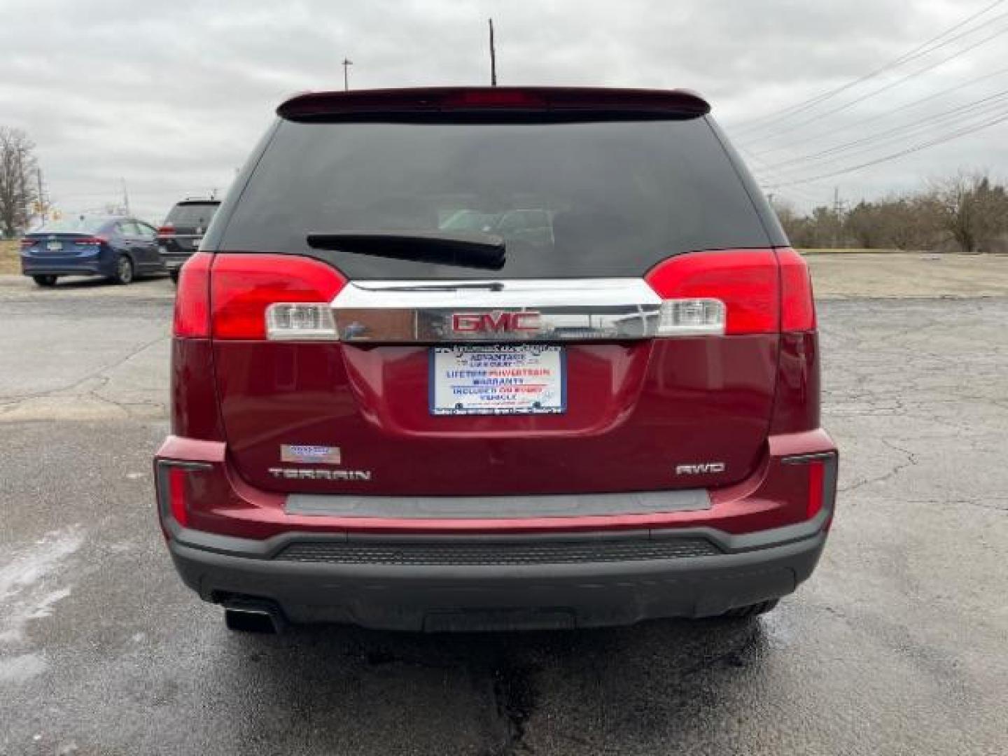 2017 Crimson Red Tintcoat GMC Terrain SLE2 AWD (2GKFLSEKXH6) with an 2.4L L4 DOHC 16V engine, 6-Speed Automatic transmission, located at 1099 N County Rd 25A, Troy, OH, 45373, (937) 908-9800, 40.057079, -84.212883 - Photo#4