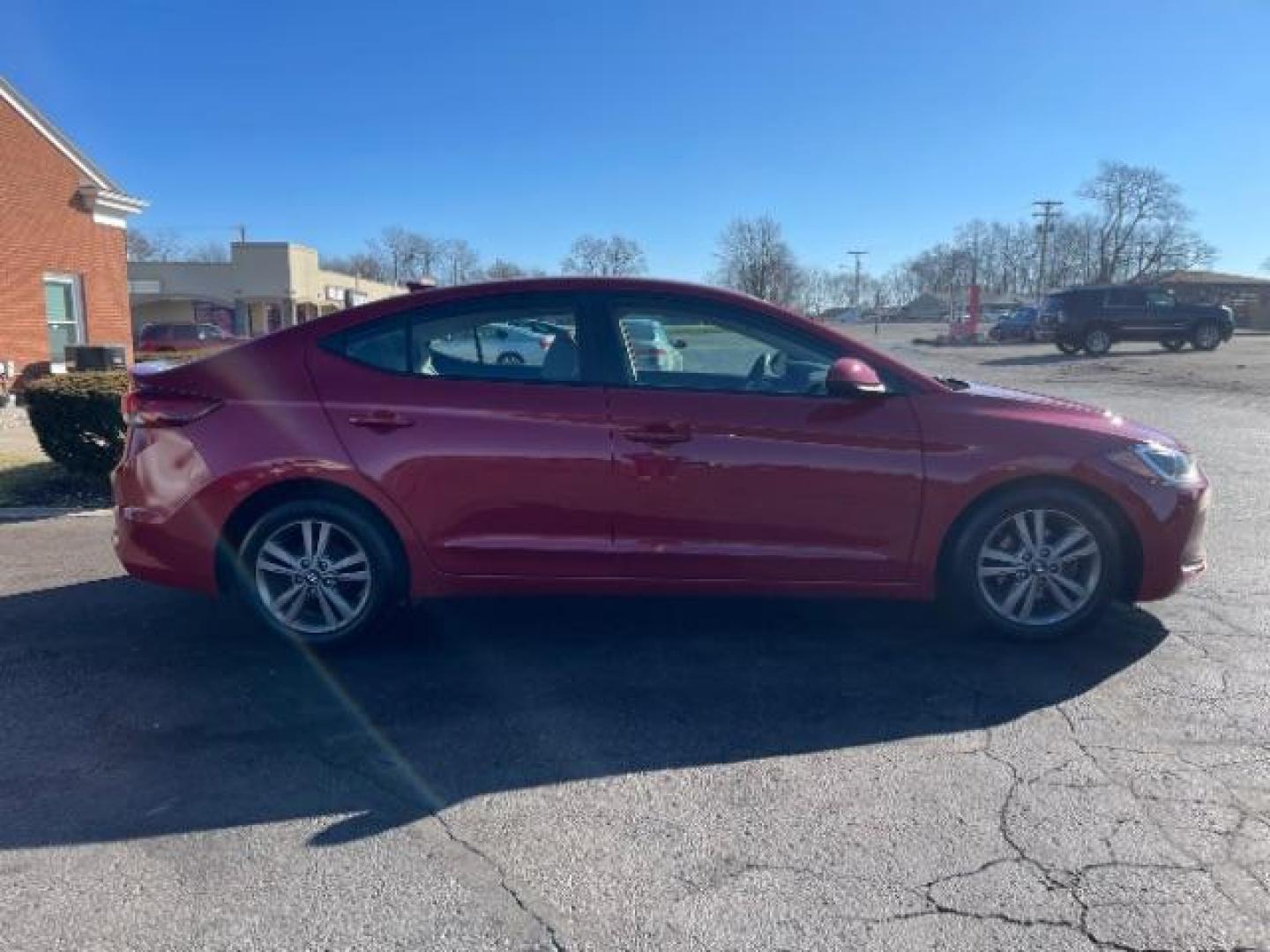 2017 Red Hyundai Elantra SE (5NPD84LF1HH) , Auto transmission, located at 4508 South Dixie Dr, Moraine, OH, 45439, (937) 908-9800, 39.689976, -84.218452 - Photo#3