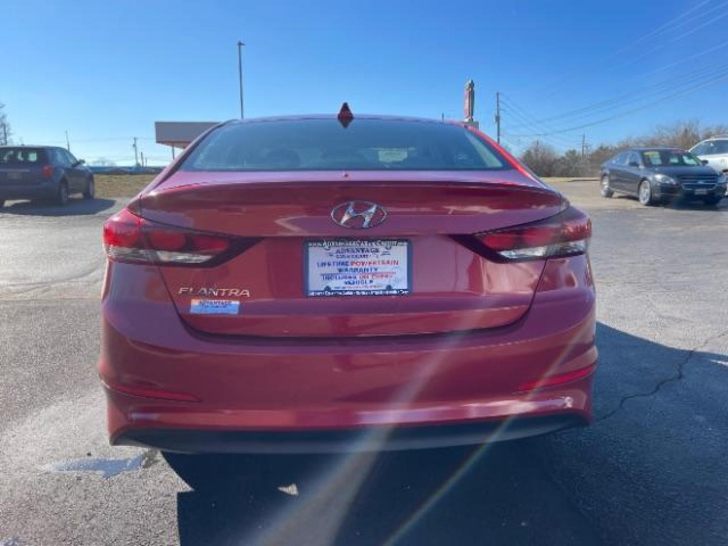 2017 Red Hyundai Elantra SE (5NPD84LF1HH) , Auto transmission, located at 4508 South Dixie Dr, Moraine, OH, 45439, (937) 908-9800, 39.689976, -84.218452 - Photo#5