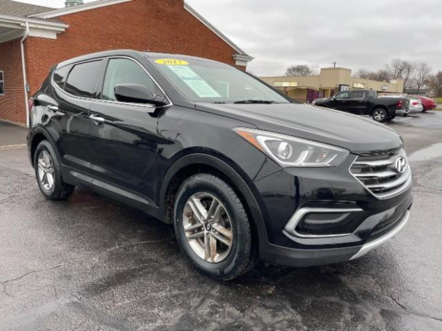 2017 Twilight Black Hyundai Santa Fe Sport 2.4 FWD (5XYZT3LBXHG) with an 2.4L L4 DOHC 16V engine, 6-Speed Automatic transmission, located at 1230 East Main St, Xenia, OH, 45385, (937) 908-9800, 39.688026, -83.910172 - Photo#0