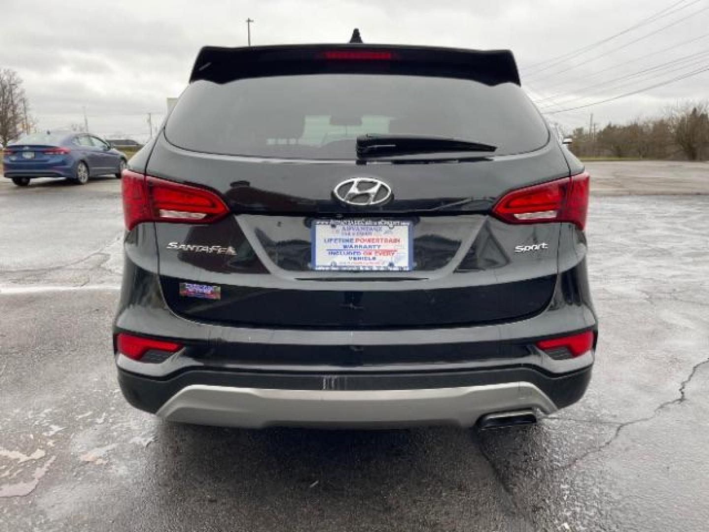 2017 Twilight Black Hyundai Santa Fe Sport 2.4 FWD (5XYZT3LBXHG) with an 2.4L L4 DOHC 16V engine, 6-Speed Automatic transmission, located at 1230 East Main St, Xenia, OH, 45385, (937) 908-9800, 39.688026, -83.910172 - Photo#4