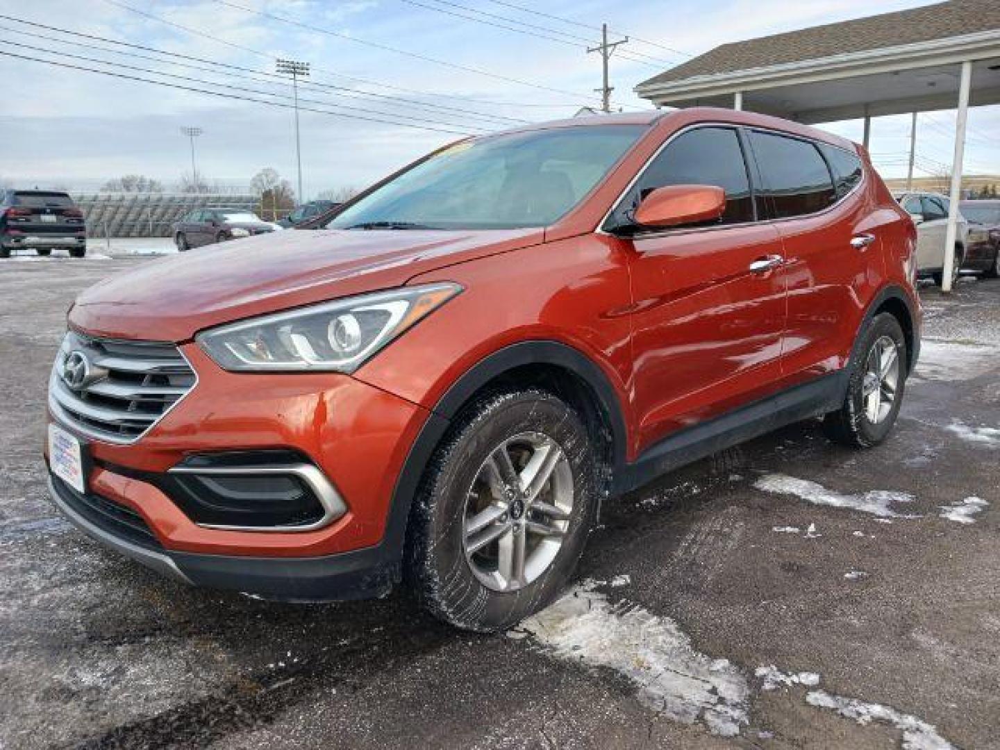 2017 Canyon Copper Hyundai Santa Fe Sport 2.4 AWD (5XYZTDLB2HG) with an 2.4L L4 DOHC 16V engine, 6-Speed Automatic transmission, located at 1184 Kauffman Ave, Fairborn, OH, 45324, (937) 908-9800, 39.807072, -84.030914 - Photo#2