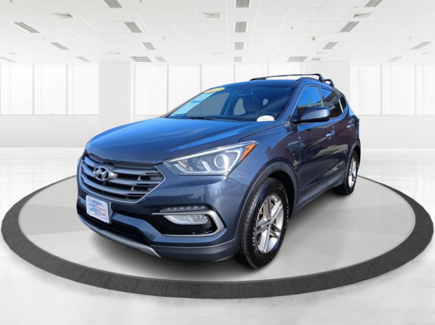 2017 Marlin Blue Hyundai Santa Fe Sport 2.4 FWD (5NMZU3LB6HH) with an 2.4L L4 DOHC 16V engine, 6-Speed Automatic transmission, located at 1184 Kauffman Ave, Fairborn, OH, 45324, (937) 908-9800, 39.807072, -84.030914 - Photo#7